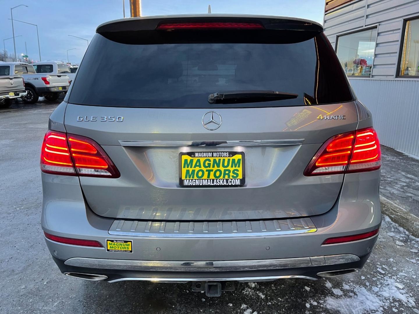 2016 Gray /Black Mercedes-Benz GLE-Class GLE350 4MATIC (4JGDA5HB5GA) with an 3.5L V6 DOHC 24V engine, 7A transmission, located at 1960 Industrial Drive, Wasilla, 99654, (907) 274-2277, 61.573475, -149.400146 - Photo#3