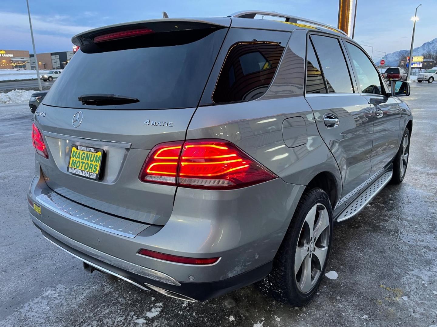 2016 Gray /Black Mercedes-Benz GLE-Class GLE350 4MATIC (4JGDA5HB5GA) with an 3.5L V6 DOHC 24V engine, 7A transmission, located at 1960 Industrial Drive, Wasilla, 99654, (907) 274-2277, 61.573475, -149.400146 - Photo#4