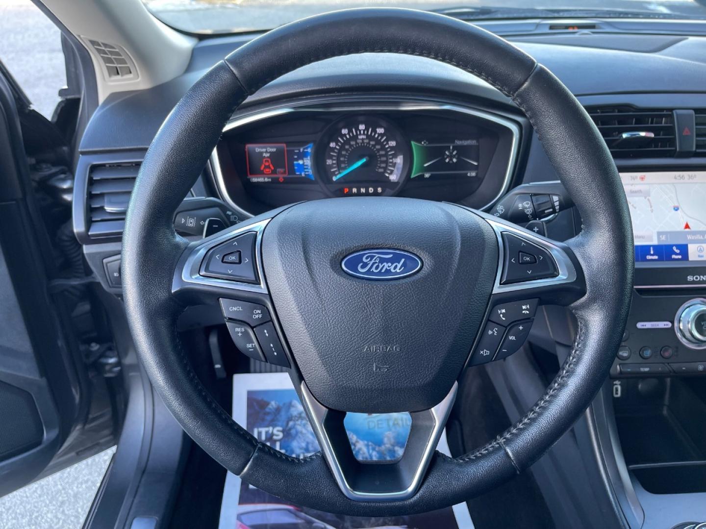 2020 Gray /Black Ford Fusion Titanium AWD (3FA6P0D92LR) with an 2.0L L4 DOHC 16V engine, 6A transmission, located at 1960 Industrial Drive, Wasilla, 99654, (907) 274-2277, 61.573475, -149.400146 - Photo#18