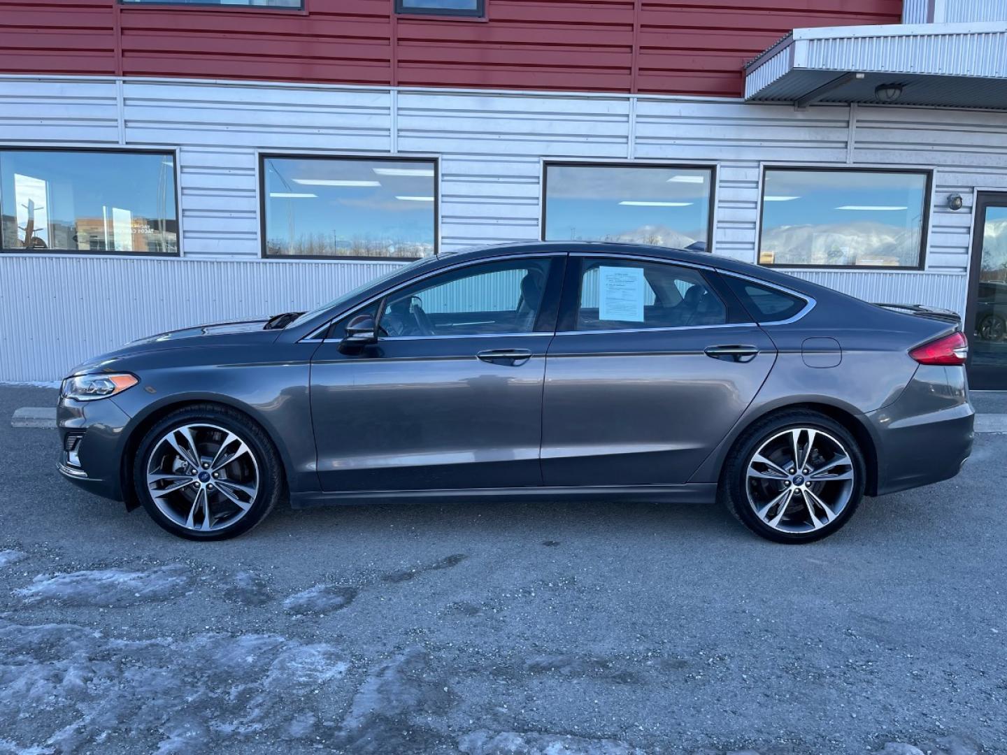 2020 Gray /Black Ford Fusion Titanium AWD (3FA6P0D92LR) with an 2.0L L4 DOHC 16V engine, 6A transmission, located at 1960 Industrial Drive, Wasilla, 99654, (907) 274-2277, 61.573475, -149.400146 - Photo#0