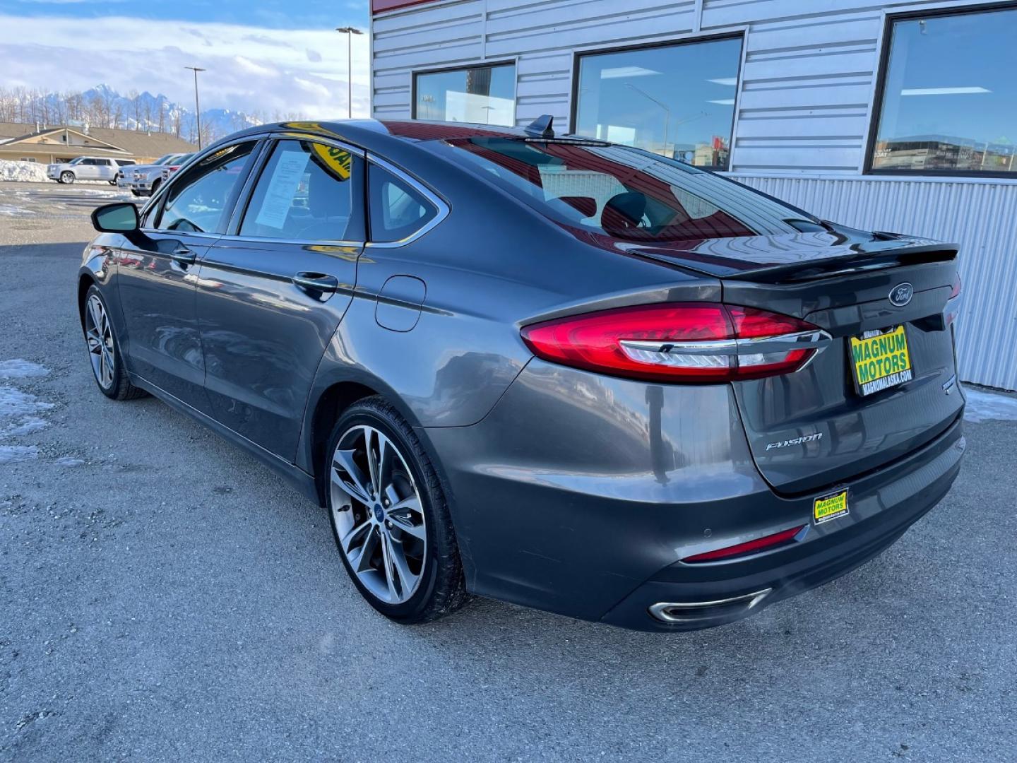 2020 Gray /Black Ford Fusion Titanium AWD (3FA6P0D92LR) with an 2.0L L4 DOHC 16V engine, 6A transmission, located at 1960 Industrial Drive, Wasilla, 99654, (907) 274-2277, 61.573475, -149.400146 - Photo#3