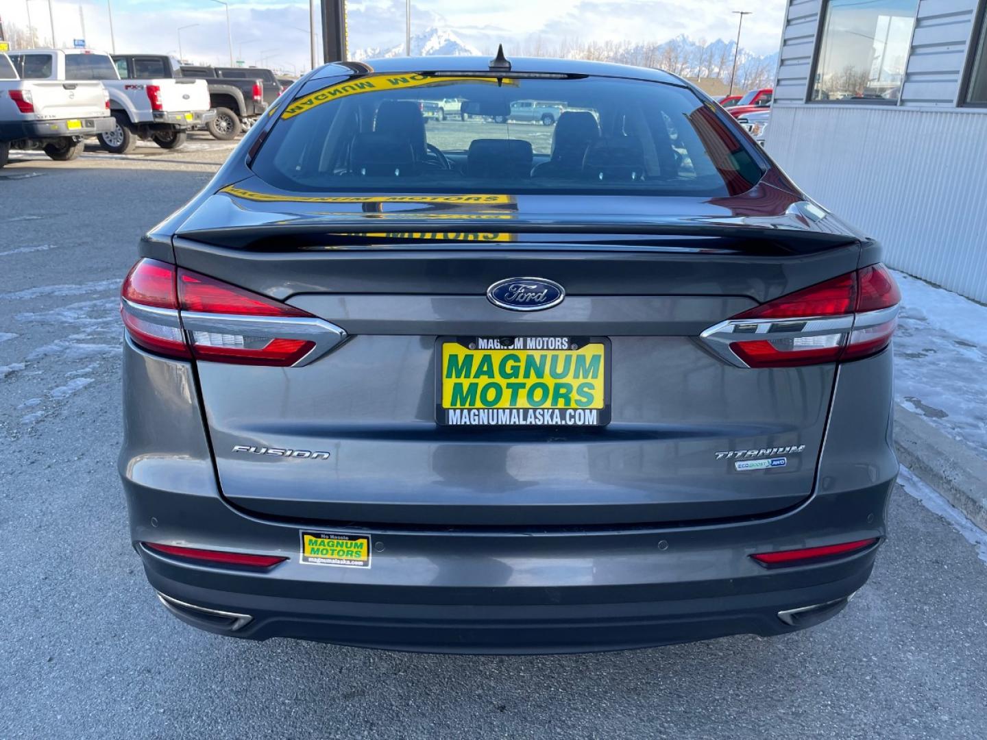 2020 Gray /Black Ford Fusion Titanium AWD (3FA6P0D92LR) with an 2.0L L4 DOHC 16V engine, 6A transmission, located at 1960 Industrial Drive, Wasilla, 99654, (907) 274-2277, 61.573475, -149.400146 - Photo#4