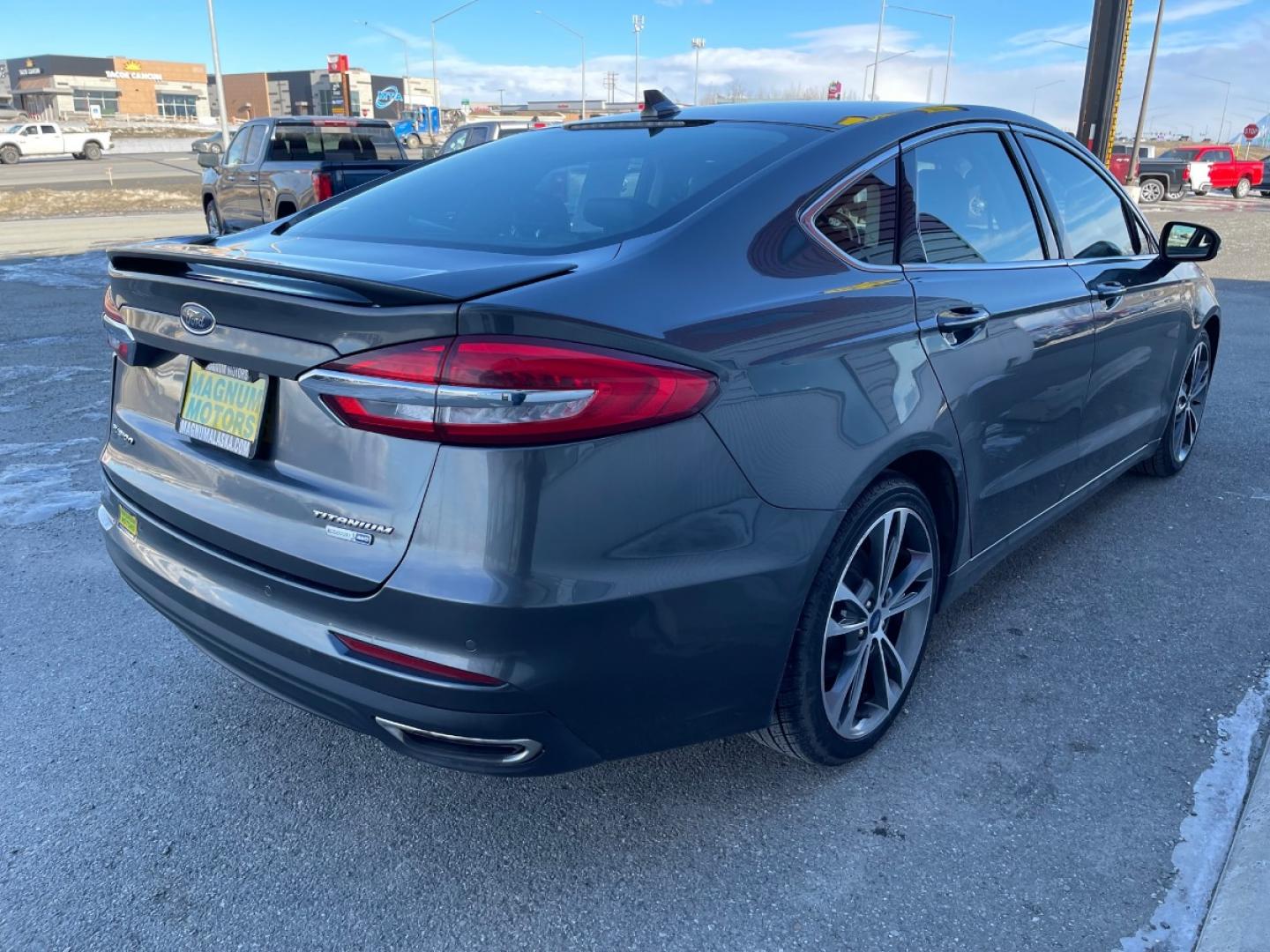 2020 Gray /Black Ford Fusion Titanium AWD (3FA6P0D92LR) with an 2.0L L4 DOHC 16V engine, 6A transmission, located at 1960 Industrial Drive, Wasilla, 99654, (907) 274-2277, 61.573475, -149.400146 - Photo#5