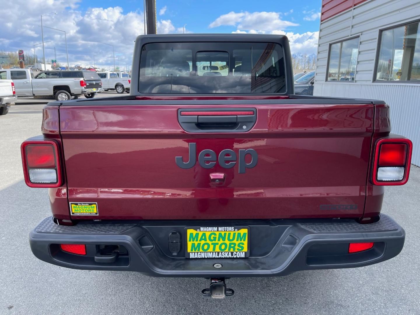 2021 MAROON /Black JEEP GLADIATOR SPORT (1C6HJTAG5ML) with an 3.6L engine, 6-Speed Manual transmission, located at 1960 Industrial Drive, Wasilla, 99654, (907) 274-2277, 61.573475, -149.400146 - Photo#3