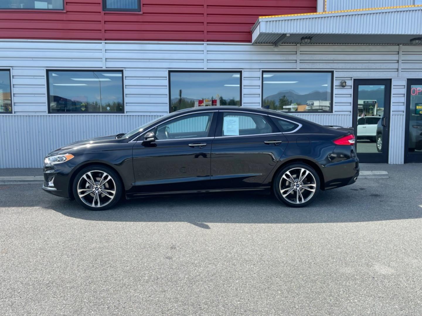 2020 Black /black Ford Fusion Titanium AWD (3FA6P0D94LR) with an 2.0L L4 DOHC 16V engine, 6A transmission, located at 1960 Industrial Drive, Wasilla, 99654, (907) 274-2277, 61.573475, -149.400146 - Photo#2