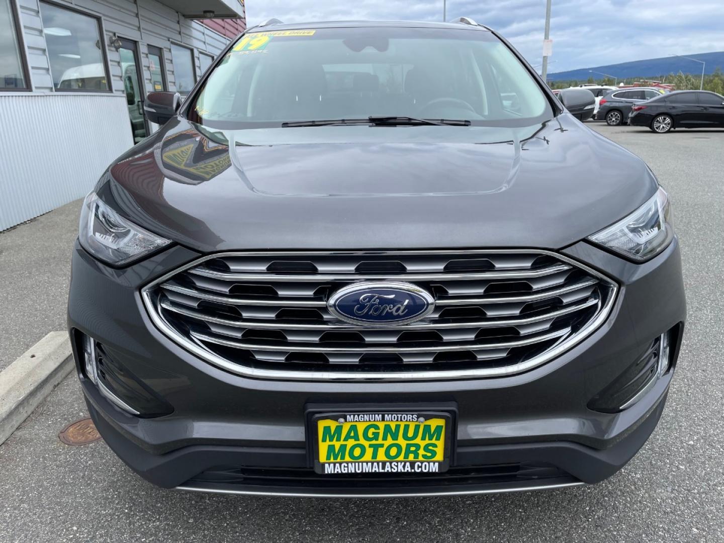 2019 Gray /Black Ford Edge Titanium AWD (2FMPK4K96KB) with an 2.0L L4 DOHC 16V engine, 6A transmission, located at 1960 Industrial Drive, Wasilla, 99654, (907) 274-2277, 61.573475, -149.400146 - Photo#6