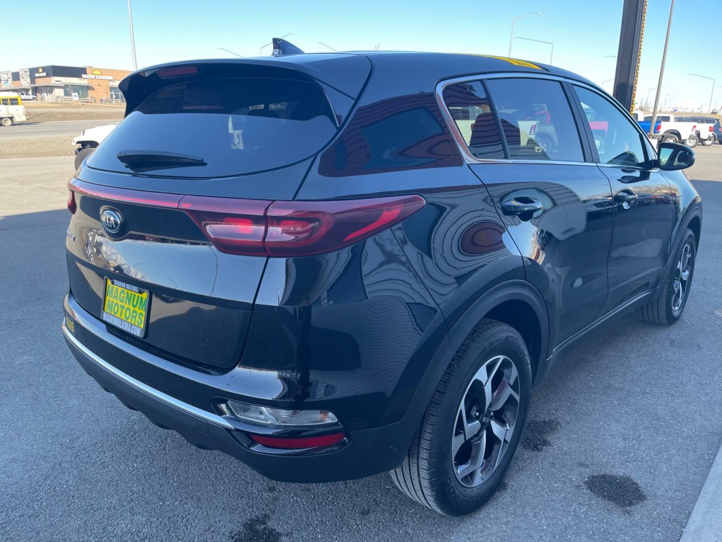 2021 Black /Black Kia Sportage LX AWD (KNDPMCAC9M7) with an 2.4L V6 DOHC 24V engine, 6A transmission, located at 1960 Industrial Drive, Wasilla, 99654, (907) 274-2277, 61.573475, -149.400146 - Photo#5