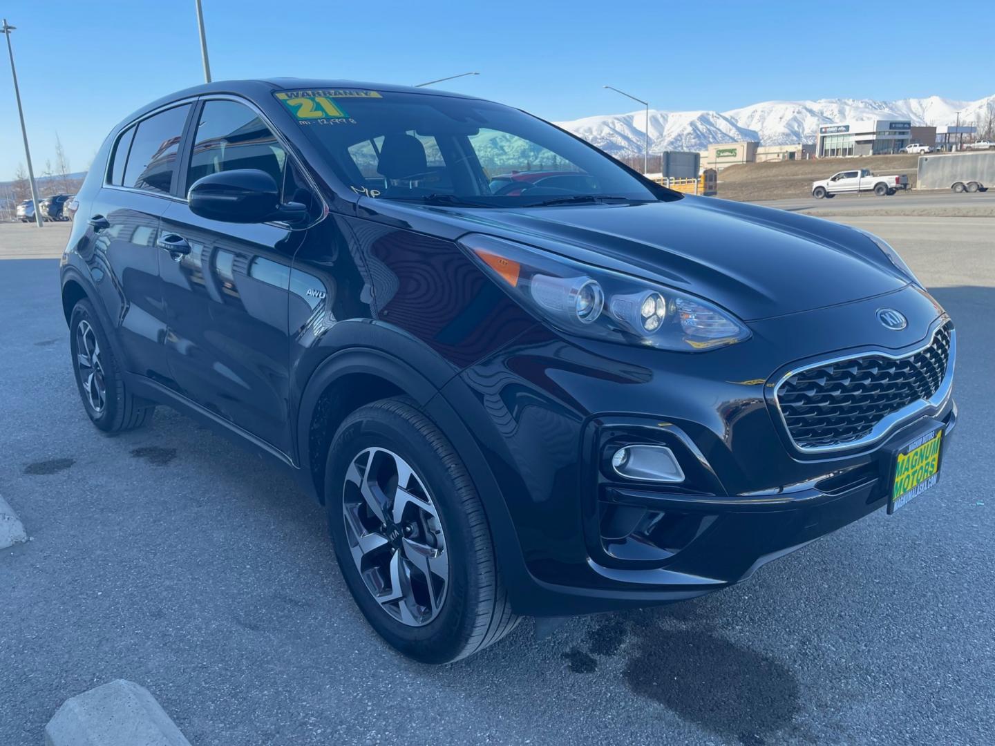 2021 Black /Black Kia Sportage LX AWD (KNDPMCAC9M7) with an 2.4L V6 DOHC 24V engine, 6A transmission, located at 1960 Industrial Drive, Wasilla, 99654, (907) 274-2277, 61.573475, -149.400146 - Photo#6