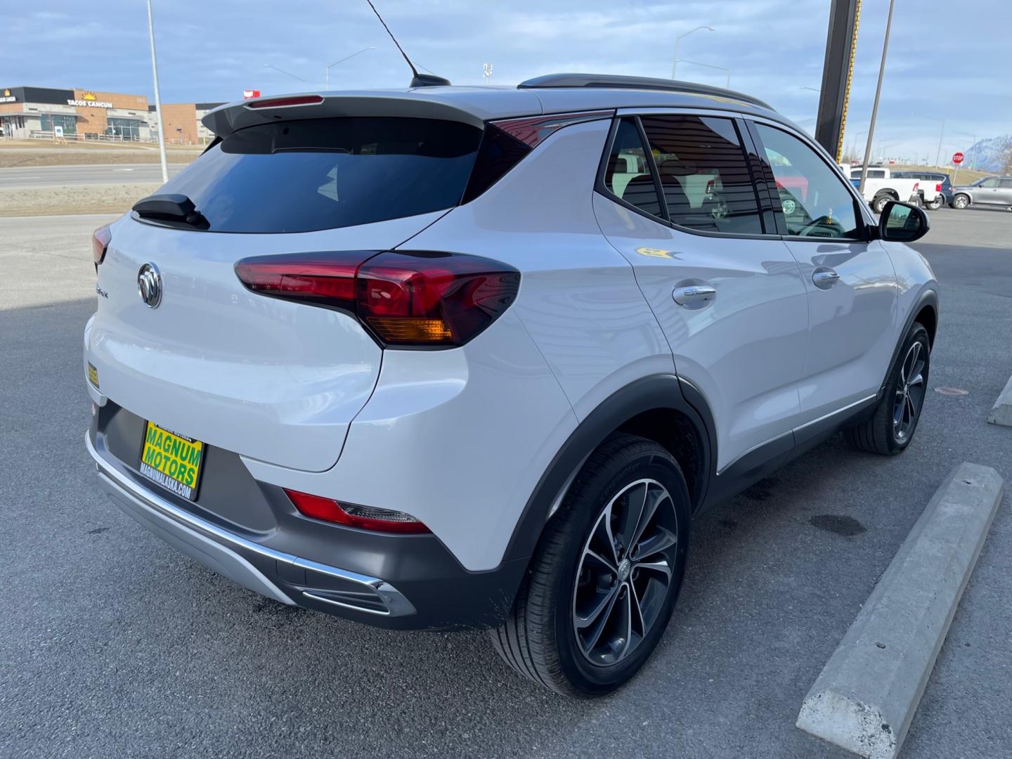 2021 White /Two-tone Buick Encore GX Essence AWD (KL4MMGSL9MB) with an 1.3L L3 TURBO engine, 9A transmission, located at 1960 Industrial Drive, Wasilla, 99654, (907) 274-2277, 61.573475, -149.400146 - Photo#5