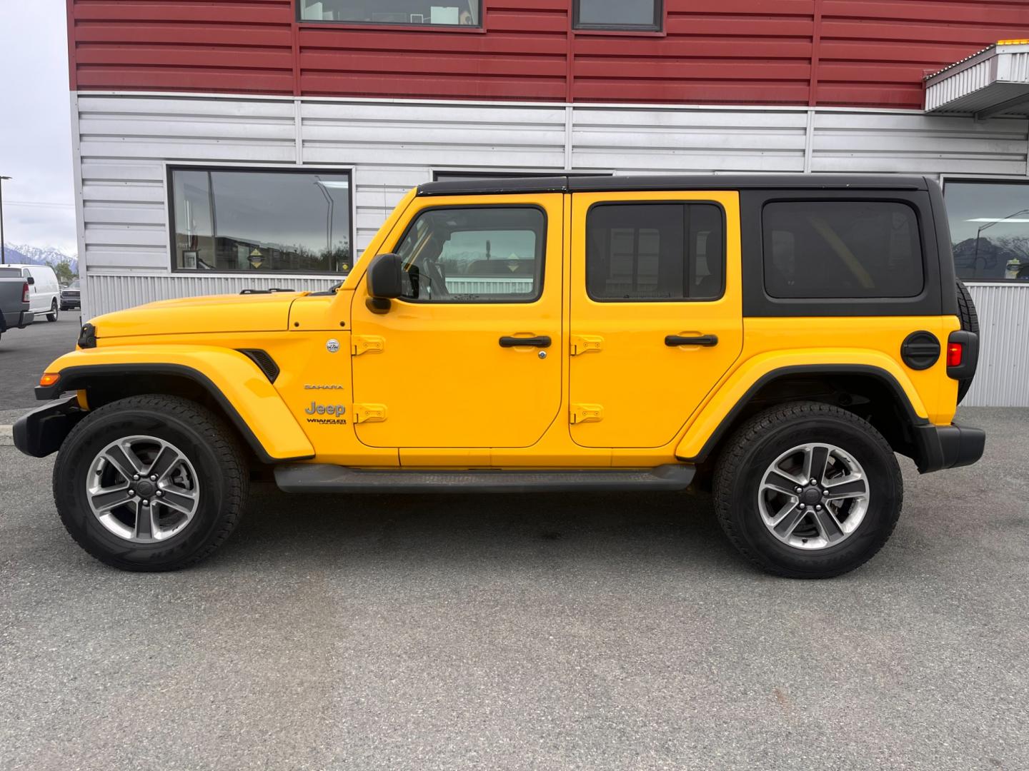 2020 YELLOW JEEP WRANGLER UNLIMI SAHARA (1C4HJXEN2LW) with an 2.0L engine, Automatic transmission, located at 1960 Industrial Drive, Wasilla, 99654, (907) 274-2277, 61.573475, -149.400146 - Photo#0