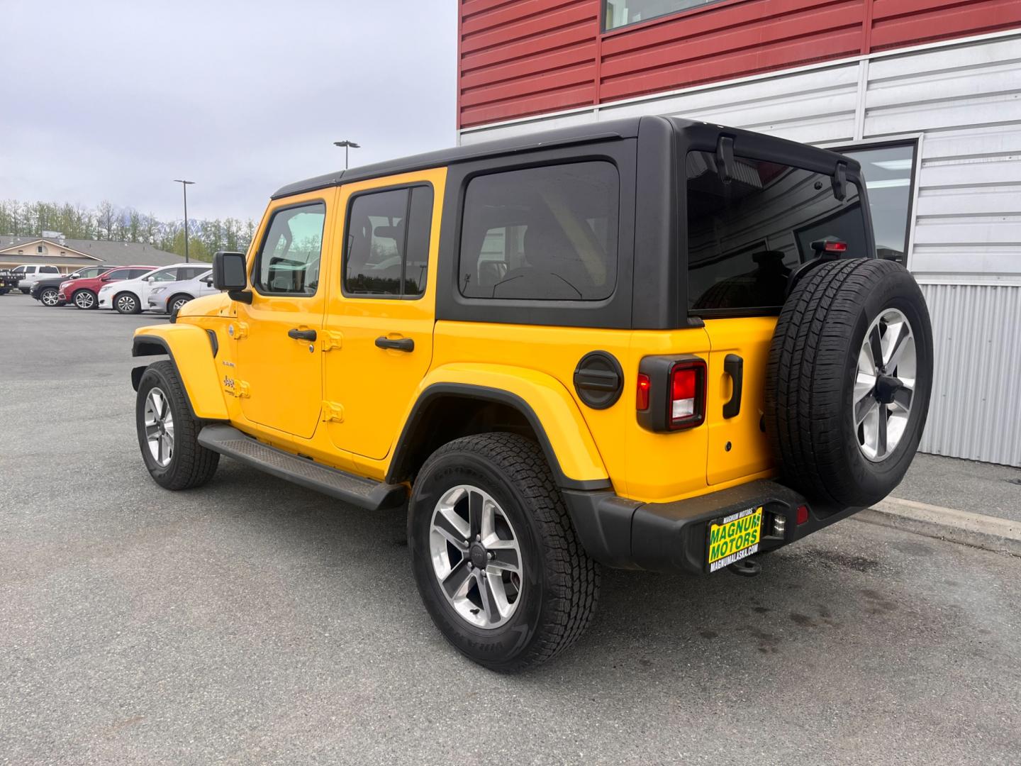 2020 YELLOW JEEP WRANGLER UNLIMI SAHARA (1C4HJXEN2LW) with an 2.0L engine, Automatic transmission, located at 1960 Industrial Drive, Wasilla, 99654, (907) 274-2277, 61.573475, -149.400146 - Photo#2