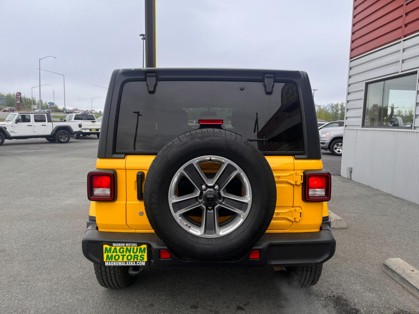 2020 YELLOW JEEP WRANGLER UNLIMI SAHARA (1C4HJXEN2LW) with an 2.0L engine, Automatic transmission, located at 1960 Industrial Drive, Wasilla, 99654, (907) 274-2277, 61.573475, -149.400146 - Photo#3