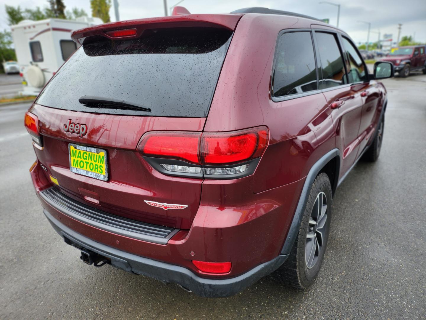 2019 Burgundy /Black Jeep Grand Cherokee Trailhawk 4WD (1C4RJFLG7KC) with an 3.6L V6 DOHC 24V engine, 8A transmission, located at 1960 Industrial Drive, Wasilla, 99654, (907) 274-2277, 61.573475, -149.400146 - Photo#7