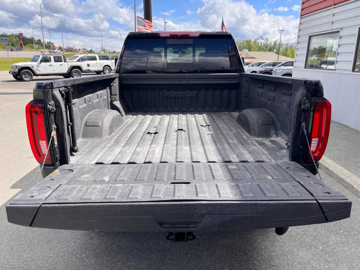 2022 Black GMC Sierra 3500HD AT4 Crew Cab Long Box 4WD (1GT49VEY3NF) with an 6.6L V8 OHV 16 DIESEL engine, 6A transmission, located at 1960 Industrial Drive, Wasilla, 99654, (907) 274-2277, 61.573475, -149.400146 - Photo#20