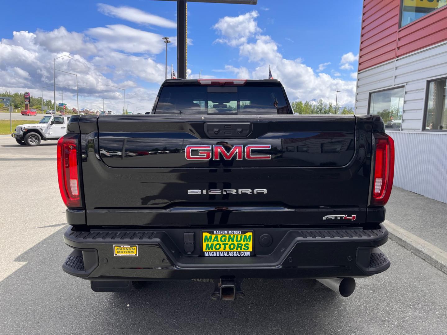 2022 Black GMC Sierra 3500HD AT4 Crew Cab Long Box 4WD (1GT49VEY3NF) with an 6.6L V8 OHV 16 DIESEL engine, 6A transmission, located at 1960 Industrial Drive, Wasilla, 99654, (907) 274-2277, 61.573475, -149.400146 - Photo#3