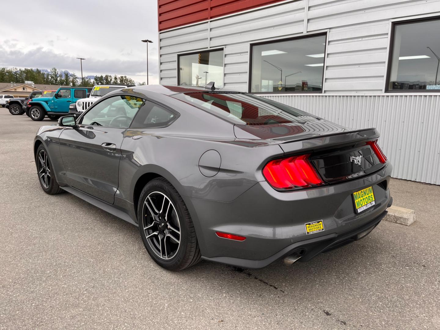 2022 GRAY FORD MUSTANG ECOBOOST (1FA6P8TH6N5) with an 2.3L engine, 6-Speed Manual transmission, located at 1960 Industrial Drive, Wasilla, 99654, (907) 274-2277, 61.573475, -149.400146 - Photo#2