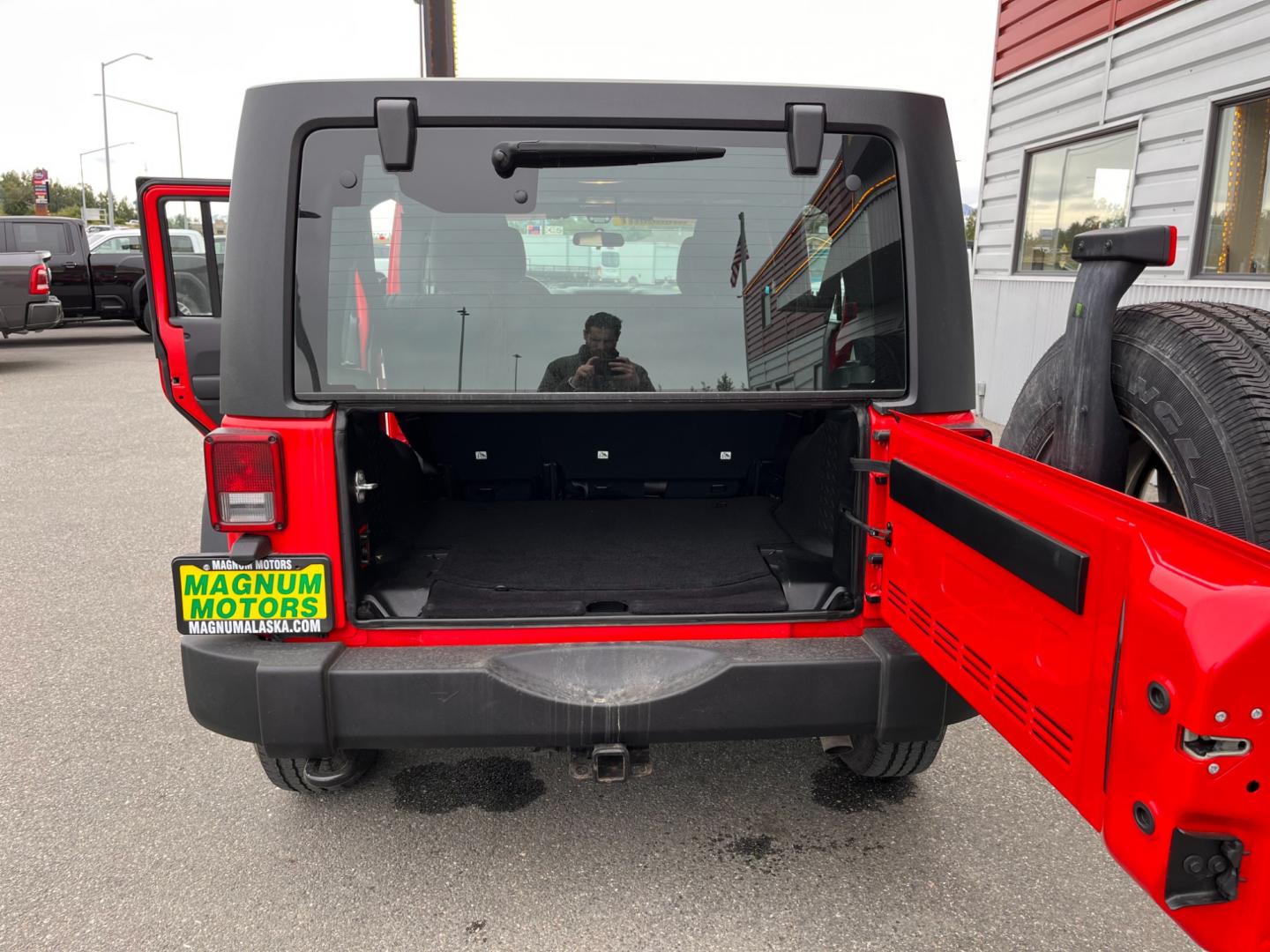 2018 RED JEEP WRANGLER JK UNL SPORT (1C4BJWDG2JL) with an 3.6L engine, 6-Speed Manual transmission, located at 1960 Industrial Drive, Wasilla, 99654, (907) 274-2277, 61.573475, -149.400146 - Photo#10