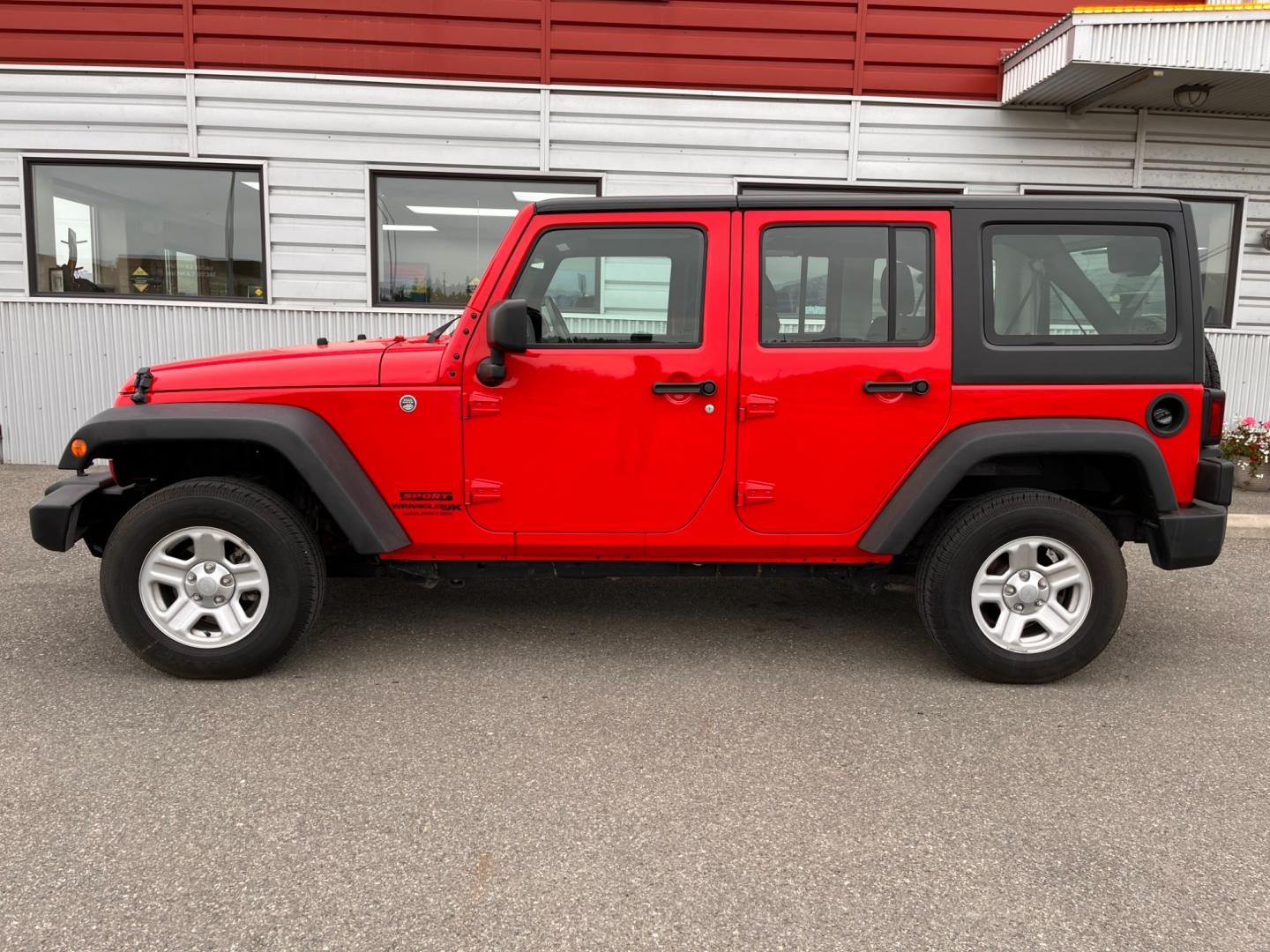 2018 RED JEEP WRANGLER JK UNL SPORT (1C4BJWDG2JL) with an 3.6L engine, 6-Speed Manual transmission, located at 1960 Industrial Drive, Wasilla, 99654, (907) 274-2277, 61.573475, -149.400146 - Photo#0