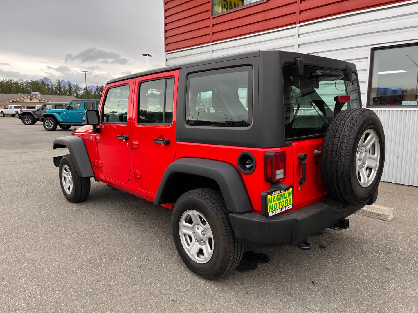 2018 RED JEEP WRANGLER JK UNL SPORT (1C4BJWDG2JL) with an 3.6L engine, 6-Speed Manual transmission, located at 1960 Industrial Drive, Wasilla, 99654, (907) 274-2277, 61.573475, -149.400146 - Photo#2