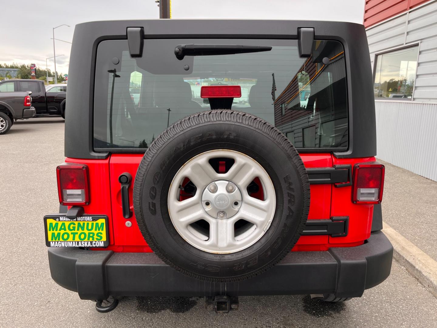 2018 RED JEEP WRANGLER JK UNL SPORT (1C4BJWDG2JL) with an 3.6L engine, 6-Speed Manual transmission, located at 1960 Industrial Drive, Wasilla, 99654, (907) 274-2277, 61.573475, -149.400146 - Photo#3