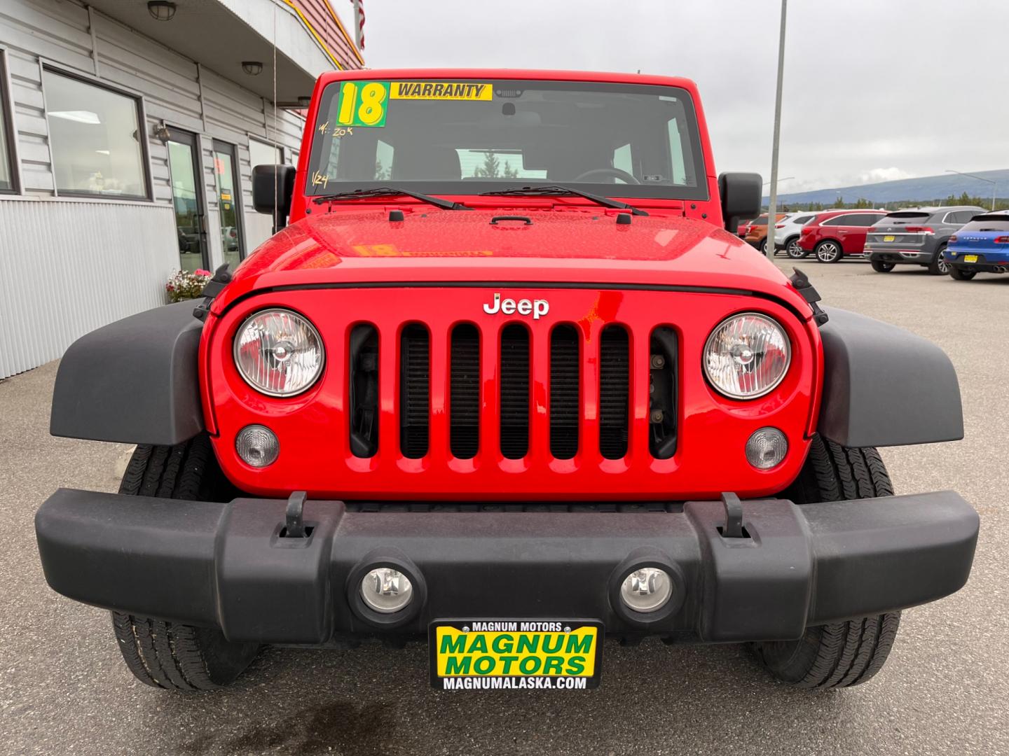 2018 RED JEEP WRANGLER JK UNL SPORT (1C4BJWDG2JL) with an 3.6L engine, 6-Speed Manual transmission, located at 1960 Industrial Drive, Wasilla, 99654, (907) 274-2277, 61.573475, -149.400146 - Photo#6