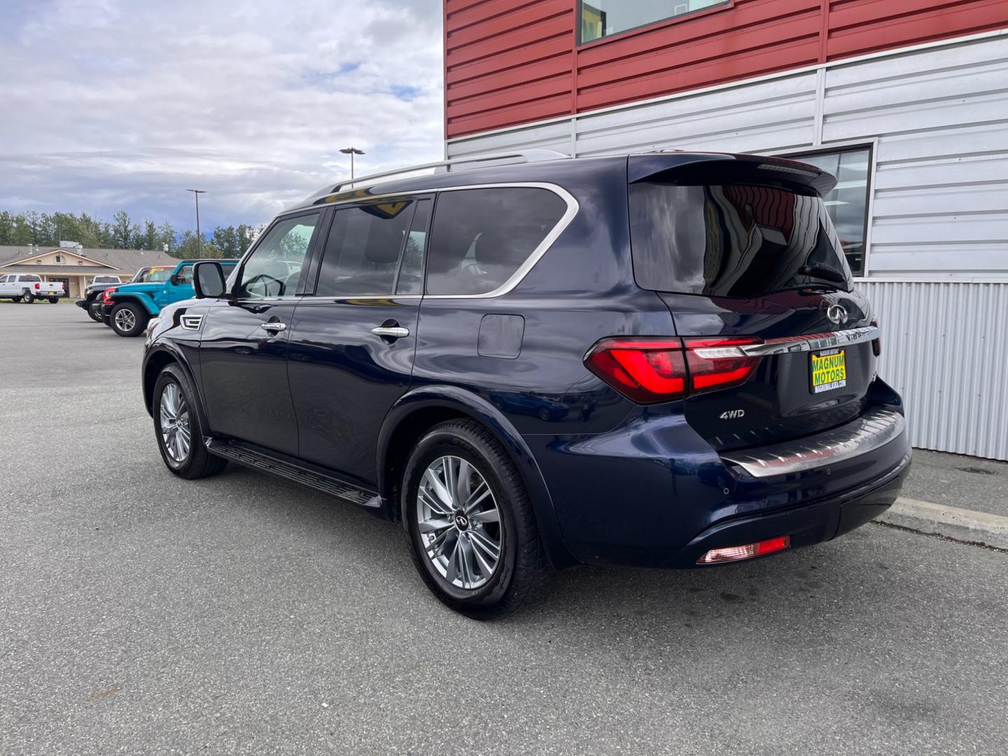 2021 BLUE INFINITI QX80 LUXE (JN8AZ2AE8M9) with an 5.6L engine, Automatic transmission, located at 1960 Industrial Drive, Wasilla, 99654, (907) 274-2277, 61.573475, -149.400146 - Photo#2