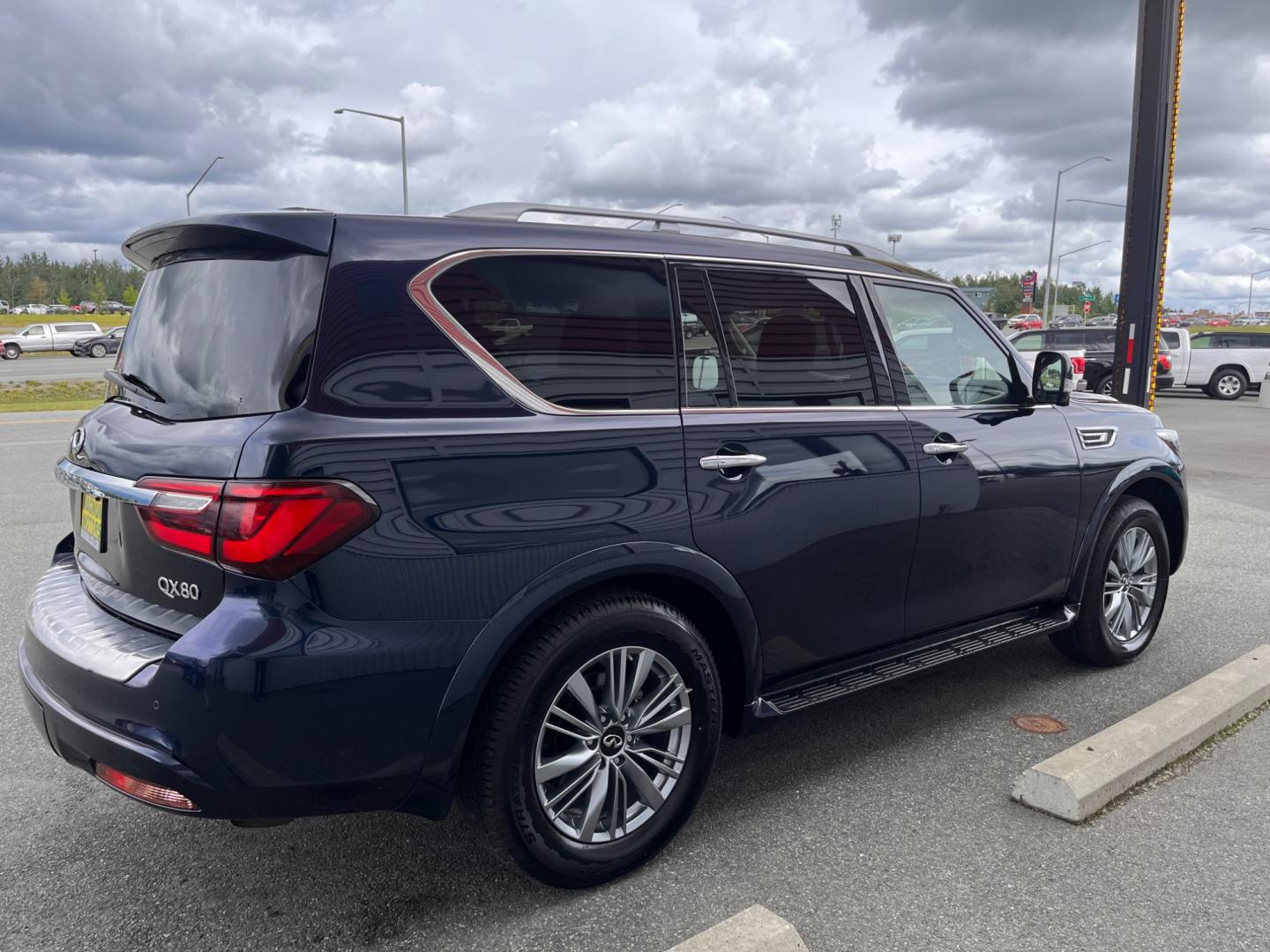 2021 BLUE INFINITI QX80 LUXE (JN8AZ2AE8M9) with an 5.6L engine, Automatic transmission, located at 1960 Industrial Drive, Wasilla, 99654, (907) 274-2277, 61.573475, -149.400146 - Photo#4