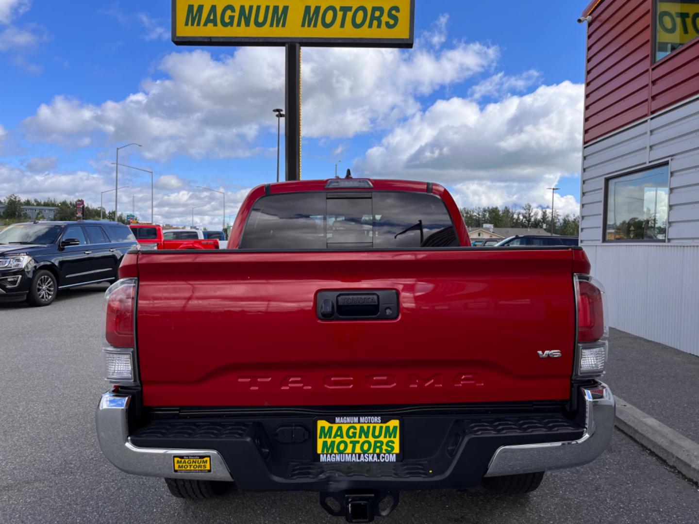 2022 Red Toyota Tacoma SR5 Double Cab V6 6AT 4WD (3TMCZ5AN5NM) with an 3.5L V6 DOHC 24V engine, 6A transmission, located at 1960 Industrial Drive, Wasilla, 99654, (907) 274-2277, 61.573475, -149.400146 - Photo#3