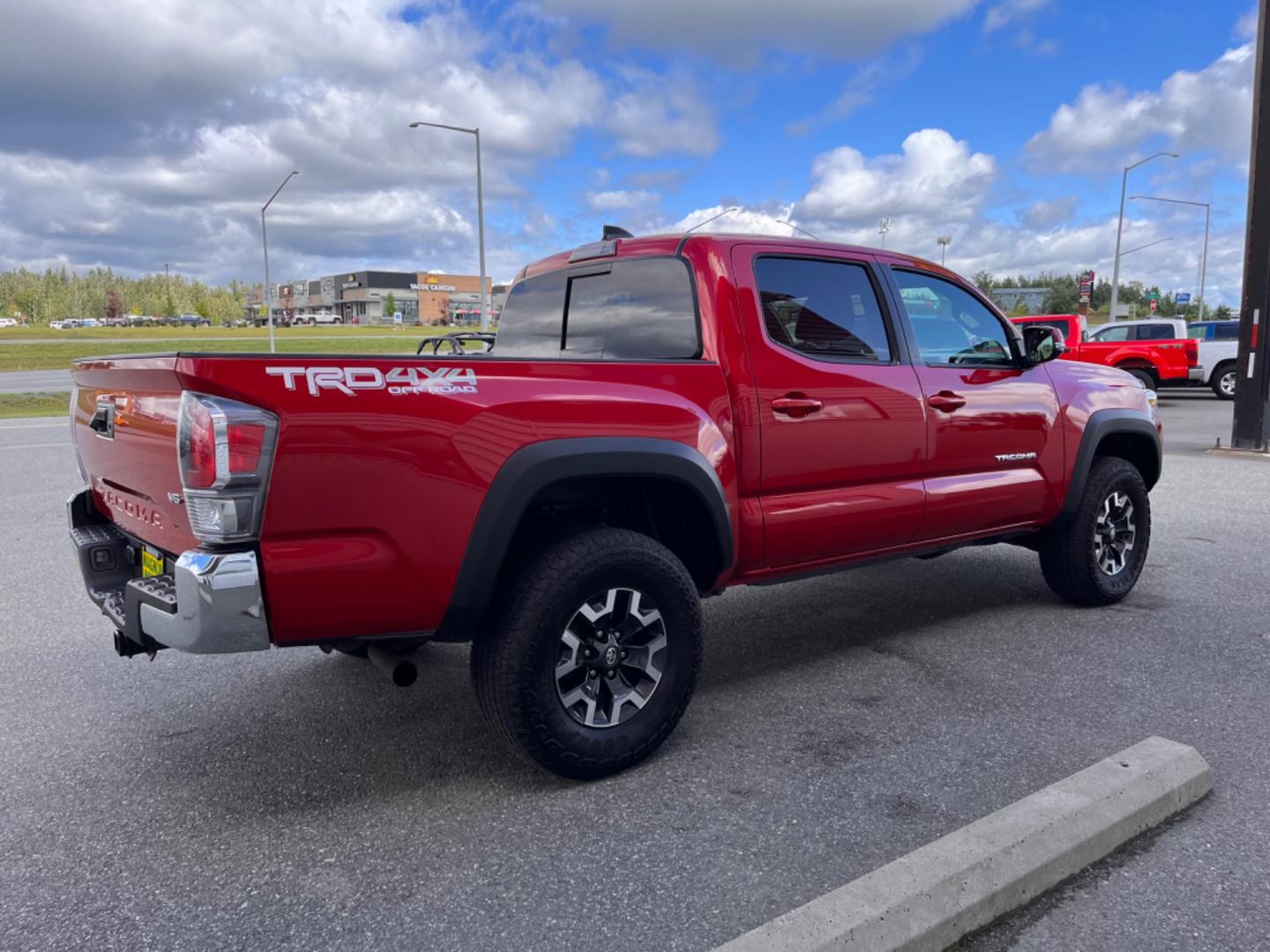 2022 Red Toyota Tacoma SR5 Double Cab V6 6AT 4WD (3TMCZ5AN5NM) with an 3.5L V6 DOHC 24V engine, 6A transmission, located at 1960 Industrial Drive, Wasilla, 99654, (907) 274-2277, 61.573475, -149.400146 - Photo#4