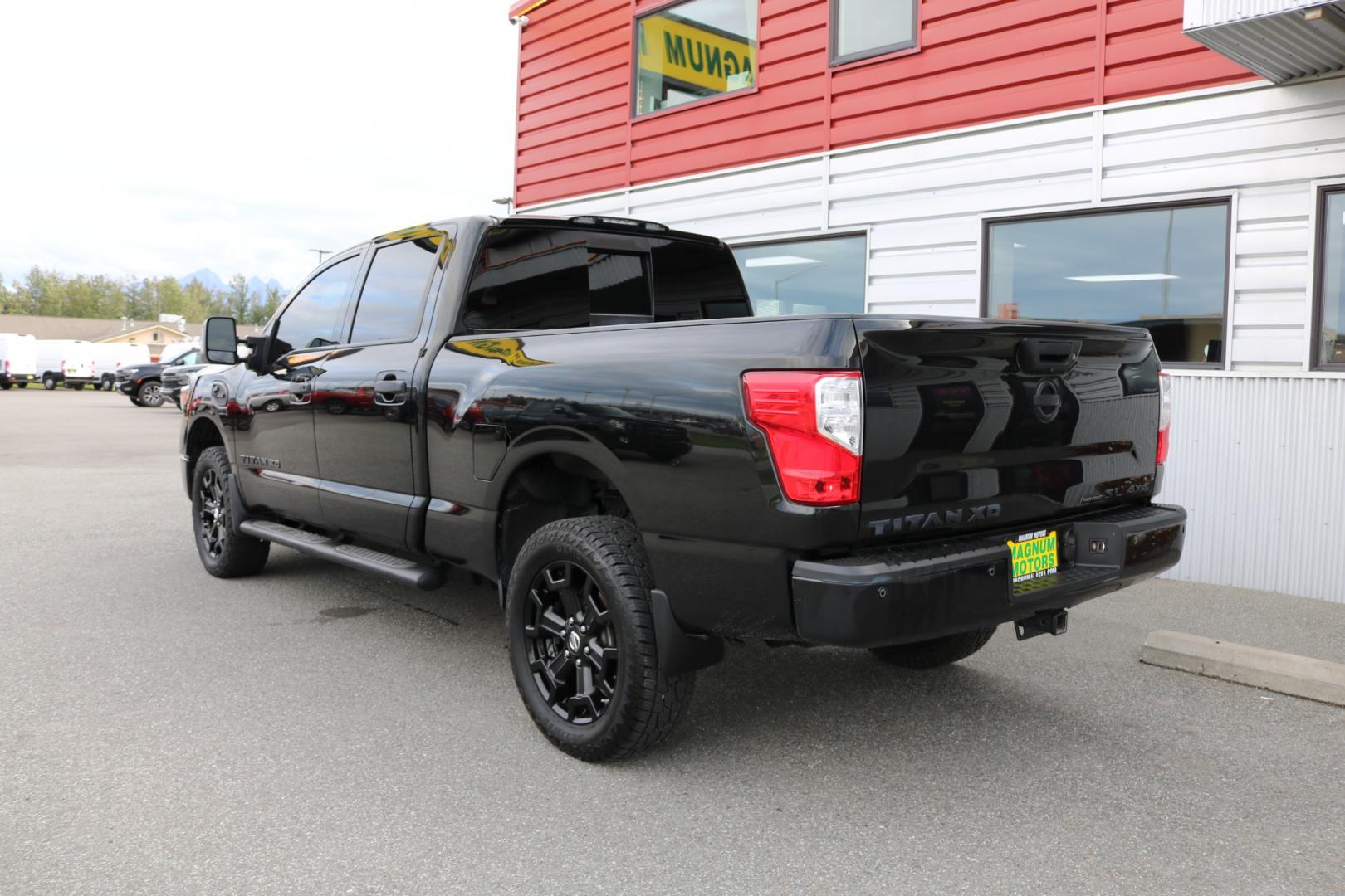 2018 BLACK /Black leather NISSAN TITAN XD SL (1N6BA1F41JN) with an 5.0L engine, Automatic transmission, located at 1960 Industrial Drive, Wasilla, 99654, (907) 274-2277, 61.573475, -149.400146 - Photo#2