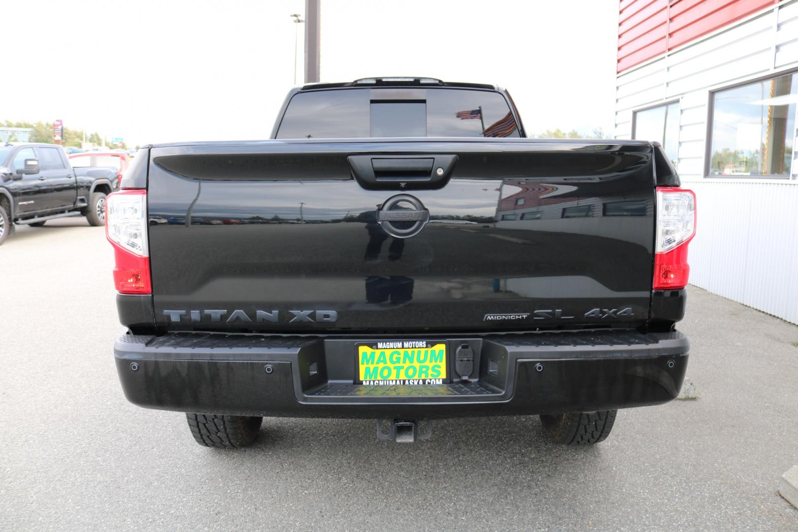 2018 BLACK /Black leather NISSAN TITAN XD SL (1N6BA1F41JN) with an 5.0L engine, Automatic transmission, located at 1960 Industrial Drive, Wasilla, 99654, (907) 274-2277, 61.573475, -149.400146 - Photo#3