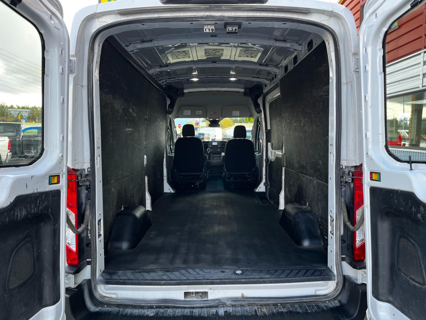 2021 White /Black Ford Transit 250 Van Med. Roof w/Sliding Pass. 148-in. WB (1FTBR2C84MK) with an 3.5L V6 DOHC 24V engine, 6A transmission, located at 1960 Industrial Drive, Wasilla, 99654, (907) 274-2277, 61.573475, -149.400146 - Photo#12