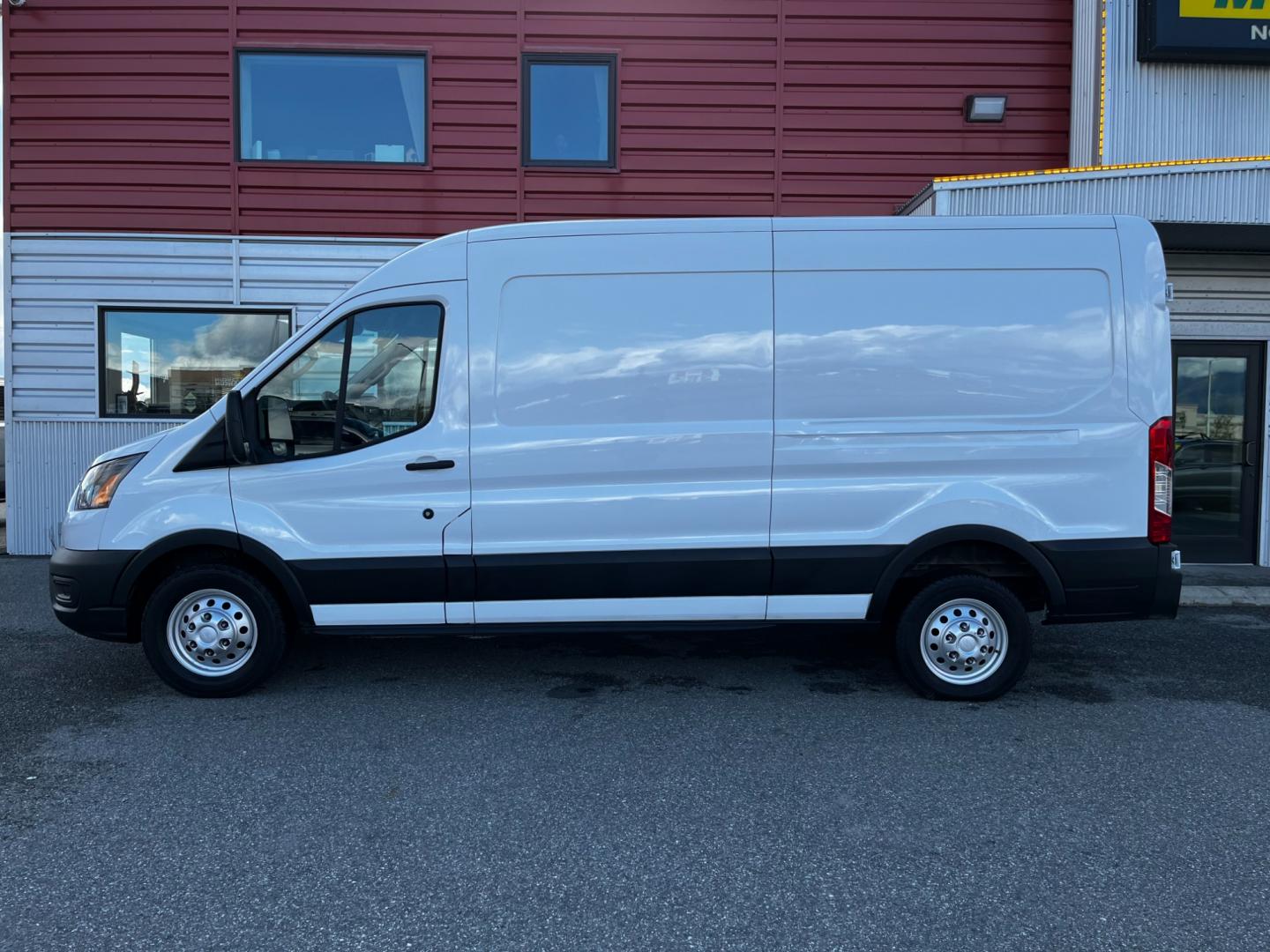 2021 White /Black Ford Transit 250 Van Med. Roof w/Sliding Pass. 148-in. WB (1FTBR2C84MK) with an 3.5L V6 DOHC 24V engine, 6A transmission, located at 1960 Industrial Drive, Wasilla, 99654, (907) 274-2277, 61.573475, -149.400146 - Photo#1