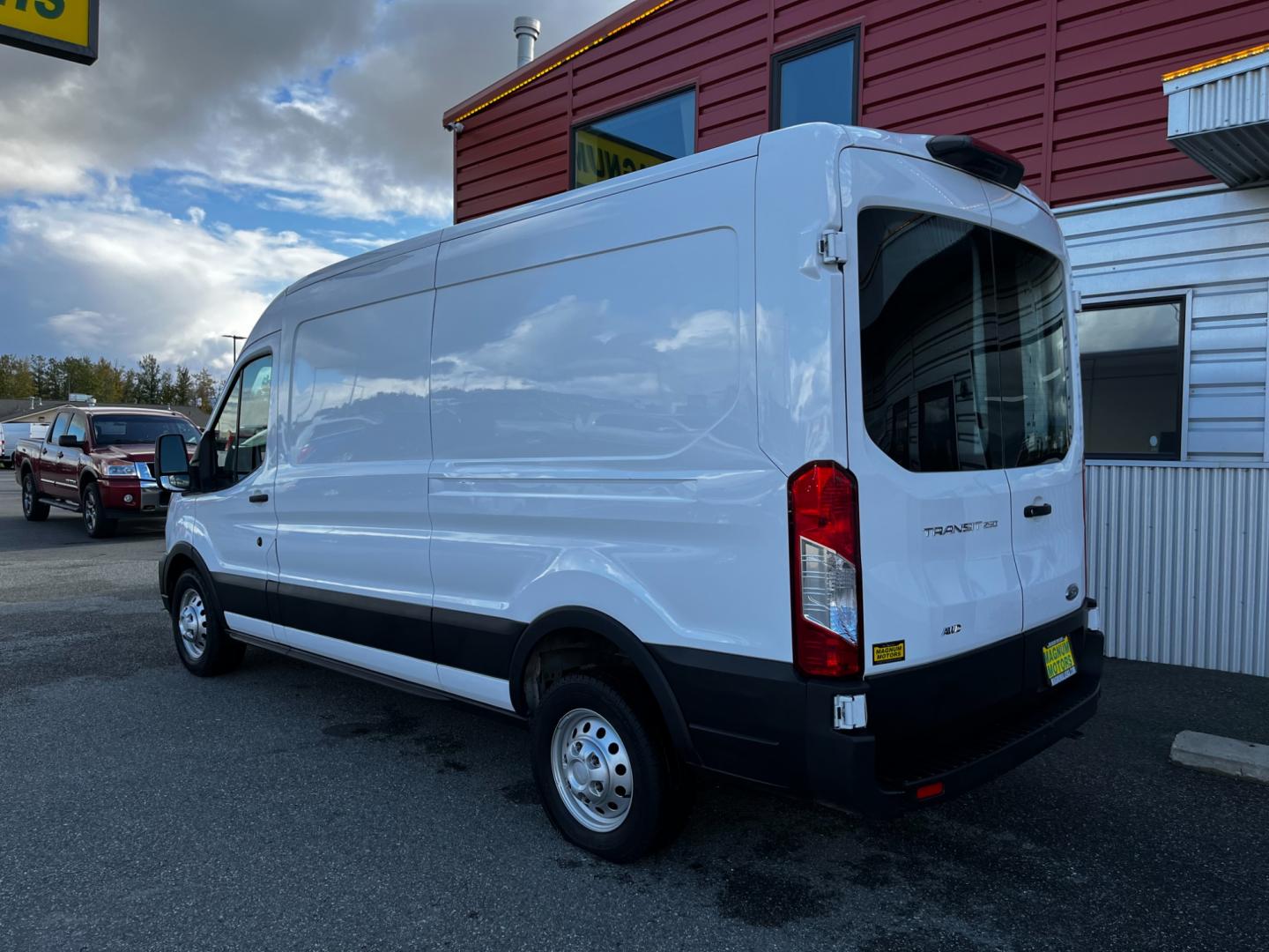 2021 White /Black Ford Transit 250 Van Med. Roof w/Sliding Pass. 148-in. WB (1FTBR2C84MK) with an 3.5L V6 DOHC 24V engine, 6A transmission, located at 1960 Industrial Drive, Wasilla, 99654, (907) 274-2277, 61.573475, -149.400146 - Photo#2