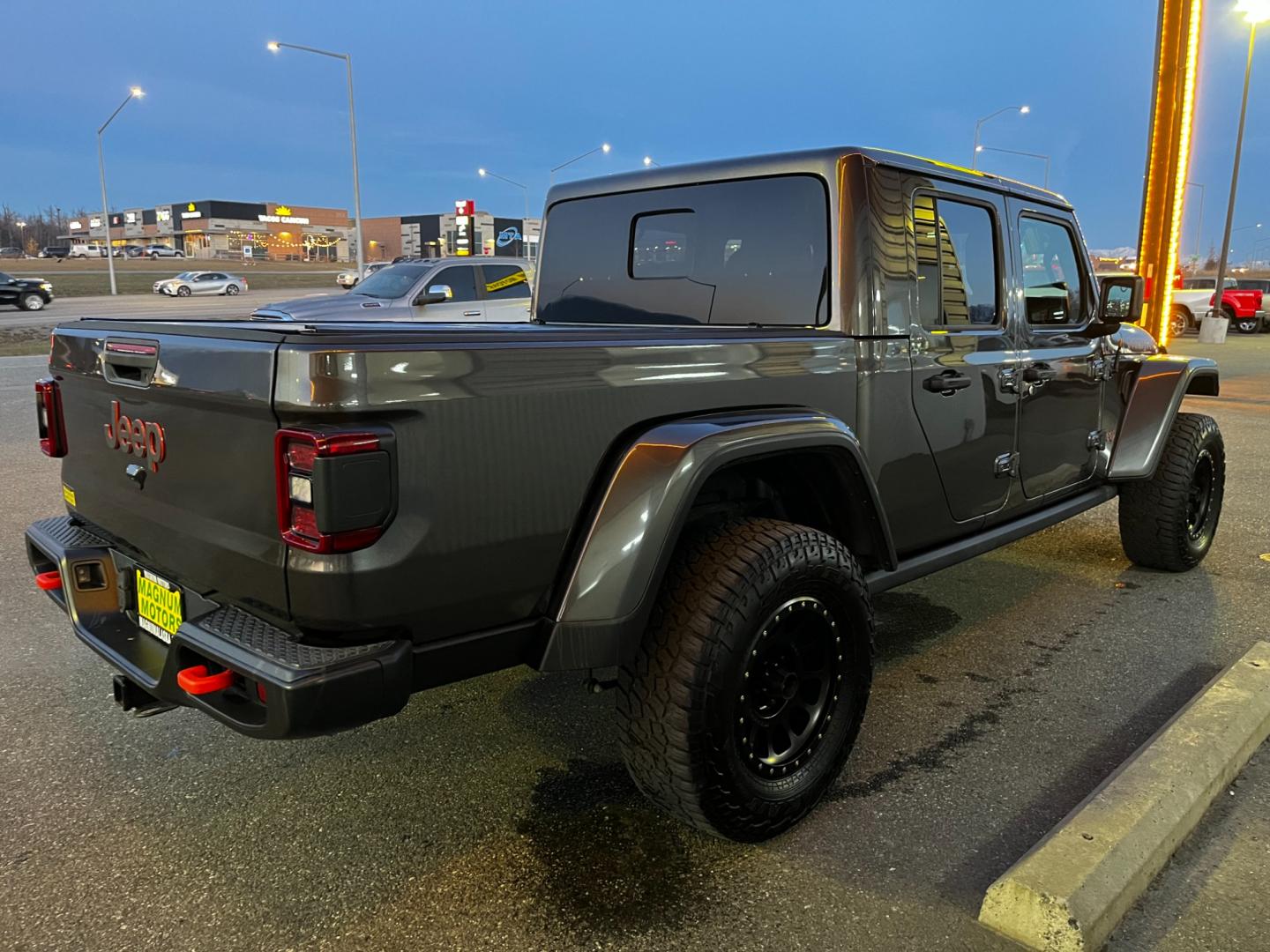 2021 Gray /Black Jeep Gladiator Mojave (1C6JJTEG5ML) with an 3.6L V6 DOHC 24V engine, Auto transmission, located at 1960 Industrial Drive, Wasilla, 99654, (907) 274-2277, 61.573475, -149.400146 - Photo#5