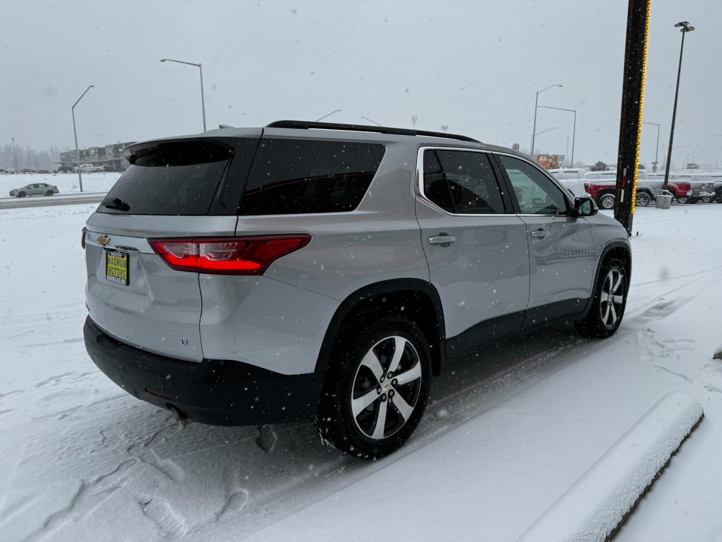 2021 Silver Chevrolet Traverse LT Leather AWD (1GNEVHKW3MJ) with an 3.6L V6 DOHC 24V engine, 9A transmission, located at 1960 Industrial Drive, Wasilla, 99654, (907) 274-2277, 61.573475, -149.400146 - Photo#5