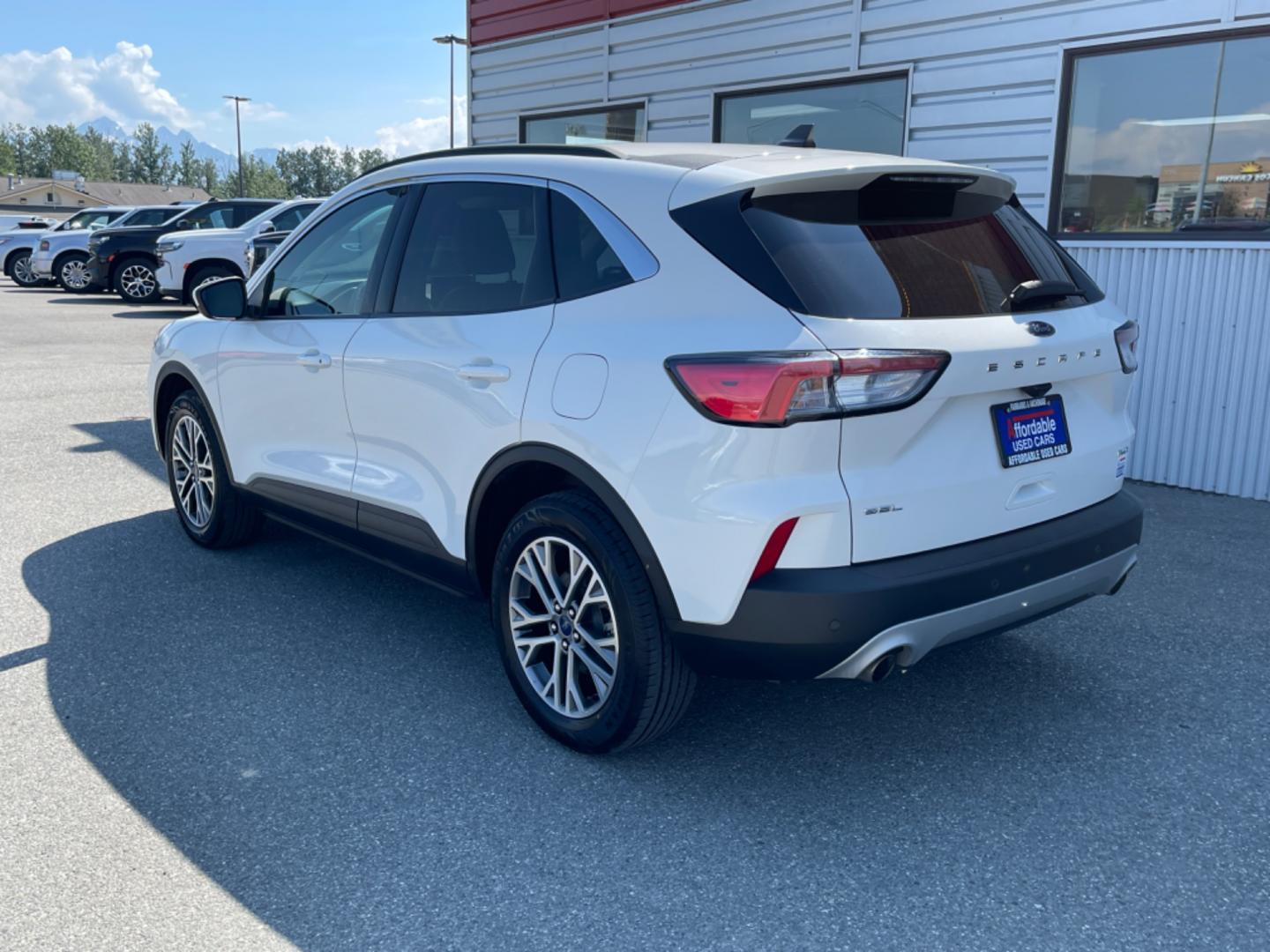 2021 WHITE FORD ESCAPE SEL (1FMCU9H61MU) with an 1.5L engine, Automatic transmission, located at 1960 Industrial Drive, Wasilla, 99654, (907) 274-2277, 61.573475, -149.400146 - Photo#2