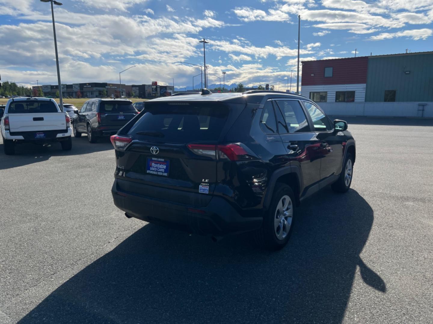 2021 BLACK TOYOTA RAV4 LE (2T3F1RFV7MW) with an 2.5L engine, Automatic transmission, located at 1960 Industrial Drive, Wasilla, 99654, (907) 274-2277, 61.573475, -149.400146 - Photo#3