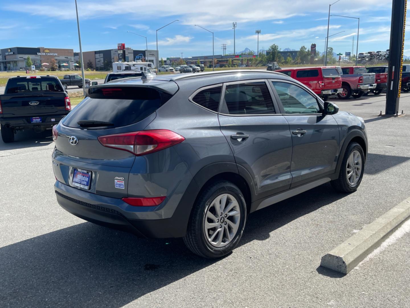 2018 GRAY HYUNDAI TUCSON SE (KM8J3CA48JU) with an 2.0L engine, Automatic transmission, located at 1960 Industrial Drive, Wasilla, 99654, (907) 274-2277, 61.573475, -149.400146 - Photo#3