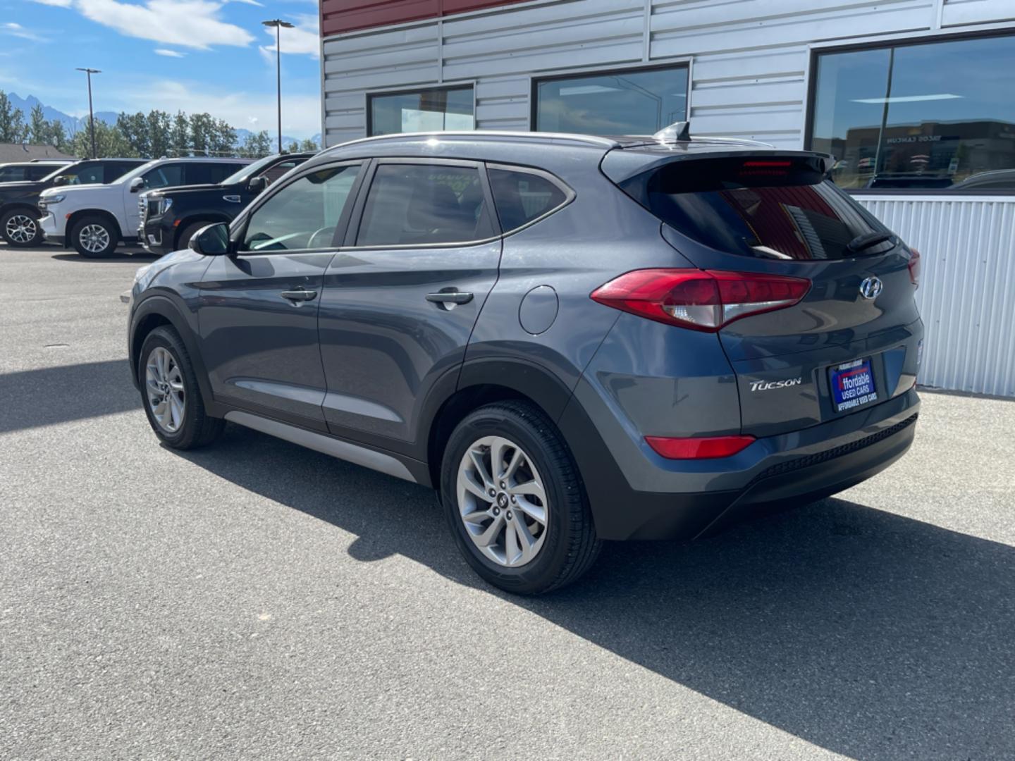 2018 GRAY HYUNDAI TUCSON SE (KM8J3CA48JU) with an 2.0L engine, Automatic transmission, located at 1960 Industrial Drive, Wasilla, 99654, (907) 274-2277, 61.573475, -149.400146 - Photo#2