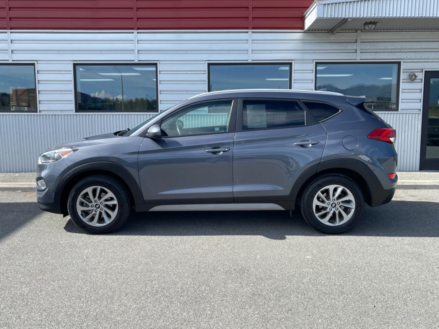 2018 GRAY HYUNDAI TUCSON SE (KM8J3CA48JU) with an 2.0L engine, Automatic transmission, located at 1960 Industrial Drive, Wasilla, 99654, (907) 274-2277, 61.573475, -149.400146 - Photo#1