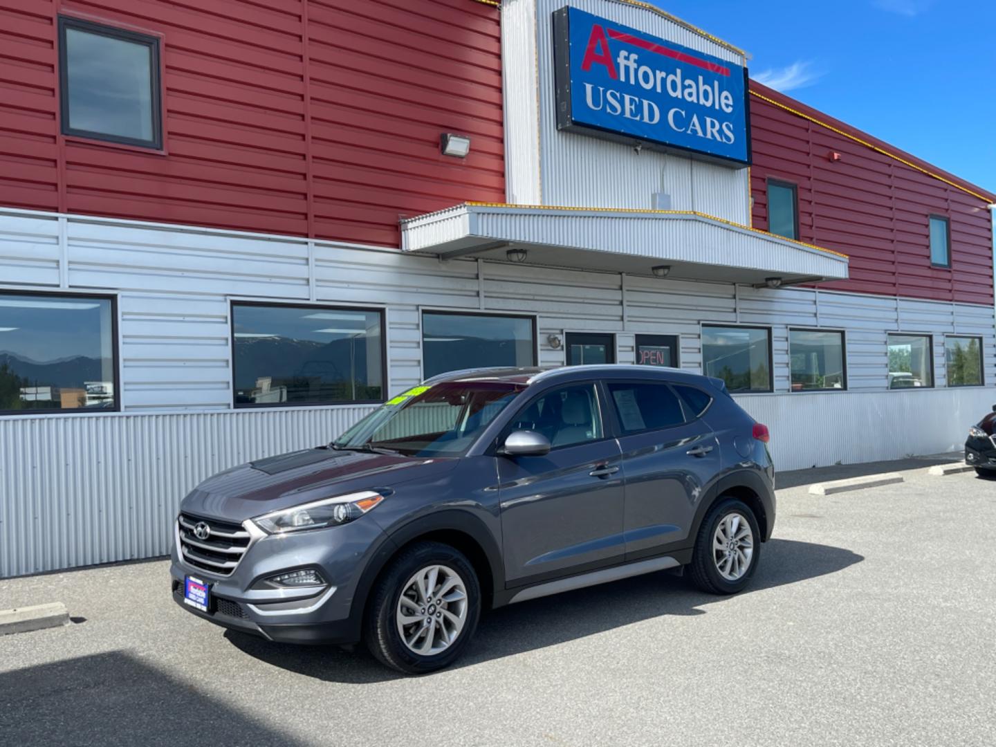 2018 GRAY HYUNDAI TUCSON SE (KM8J3CA48JU) with an 2.0L engine, Automatic transmission, located at 1960 Industrial Drive, Wasilla, 99654, (907) 274-2277, 61.573475, -149.400146 - Photo#0