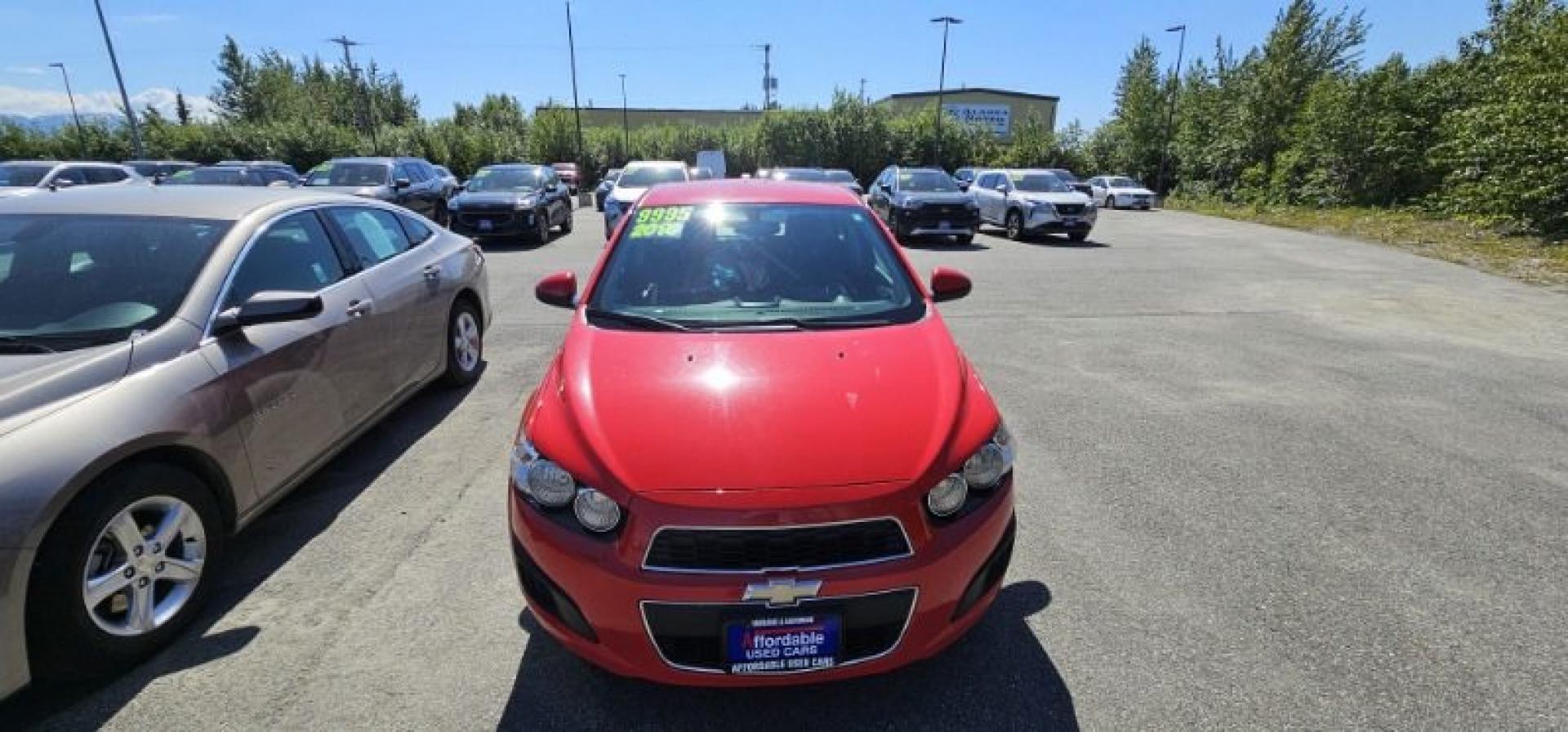 2016 RED CHEVROLET SONIC LT (1G1JC5SH7G4) with an 1.8L engine, Automatic transmission, located at 1960 Industrial Drive, Wasilla, 99654, (907) 274-2277, 61.573475, -149.400146 - Photo#2