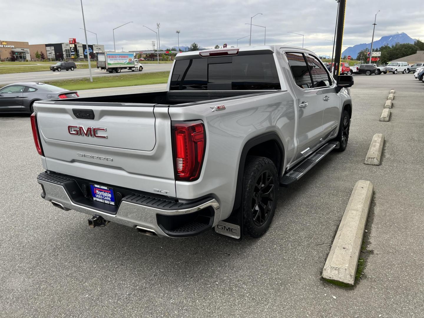 2019 GMC Sierra 1500 SLT Crew Cab 4WD (1GTU9DED4KZ) with an 5.3L V8 OHV 16V engine, 6A transmission, located at 1960 Industrial Drive, Wasilla, 99654, (907) 274-2277, 61.573475, -149.400146 - Photo#3