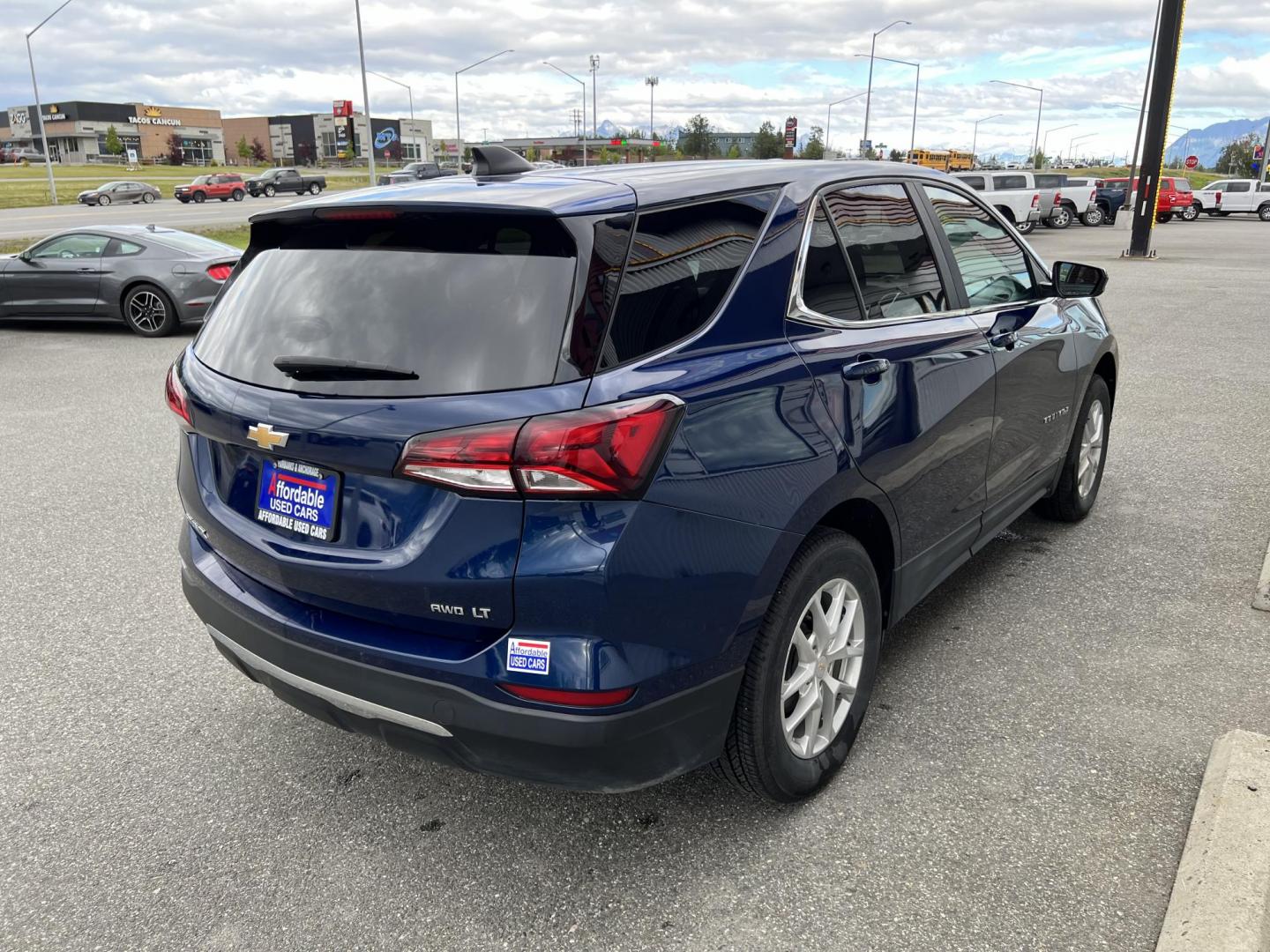 2022 BLUE CHEVROLET EQUINOX LT (3GNAXUEV0NL) with an 1.5L engine, Automatic transmission, located at 1960 Industrial Drive, Wasilla, 99654, (907) 274-2277, 61.573475, -149.400146 - Photo#3