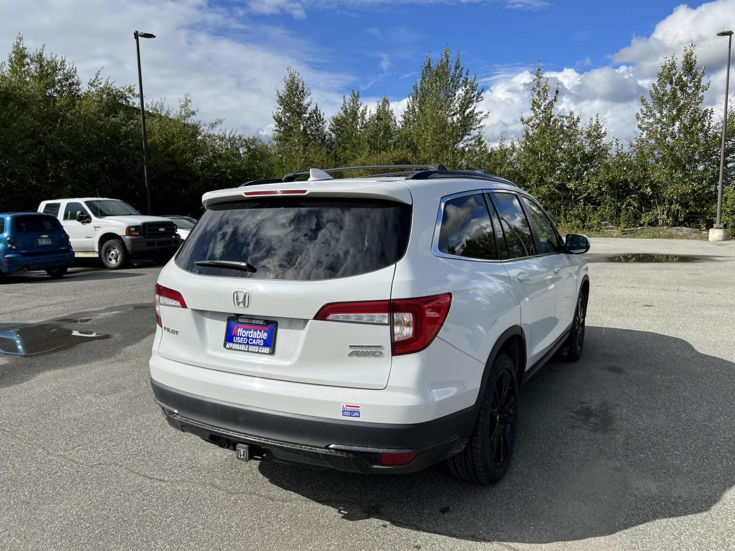 2022 Honda Pilot SE 4WD (5FNYF6H27NB) with an 3.5L V6 SOHC 24V engine, 9A transmission, located at 1960 Industrial Drive, Wasilla, 99654, (907) 274-2277, 61.573475, -149.400146 - Photo#4