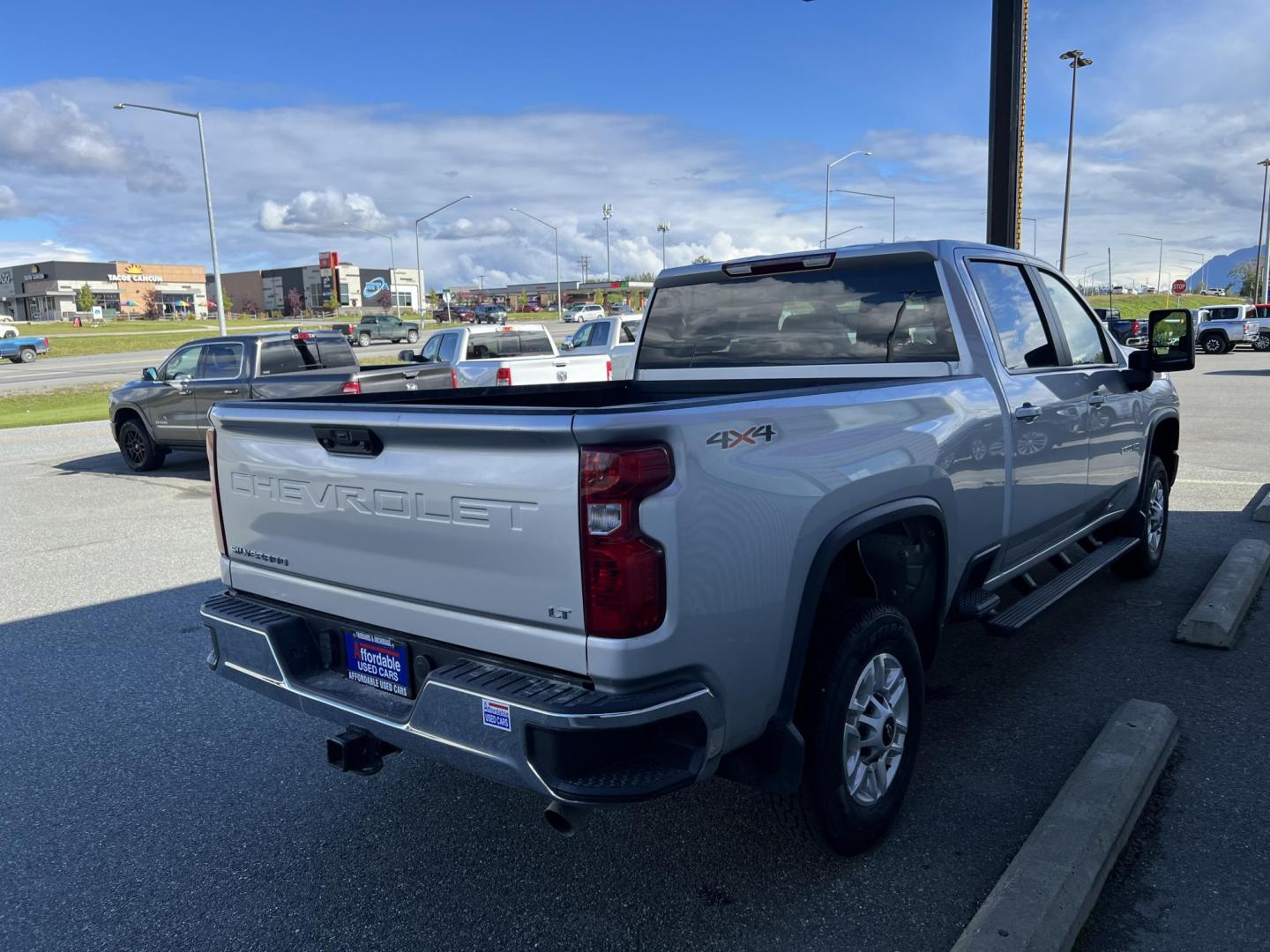 2023 Chevrolet Silverado 2500HD LT Crew Cab Short Box 4WD (2GC4YNE75P1) with an 6.6L V8 OHV 16V engine, 6A transmission, located at 1960 Industrial Drive, Wasilla, 99654, (907) 274-2277, 61.573475, -149.400146 - Photo#4