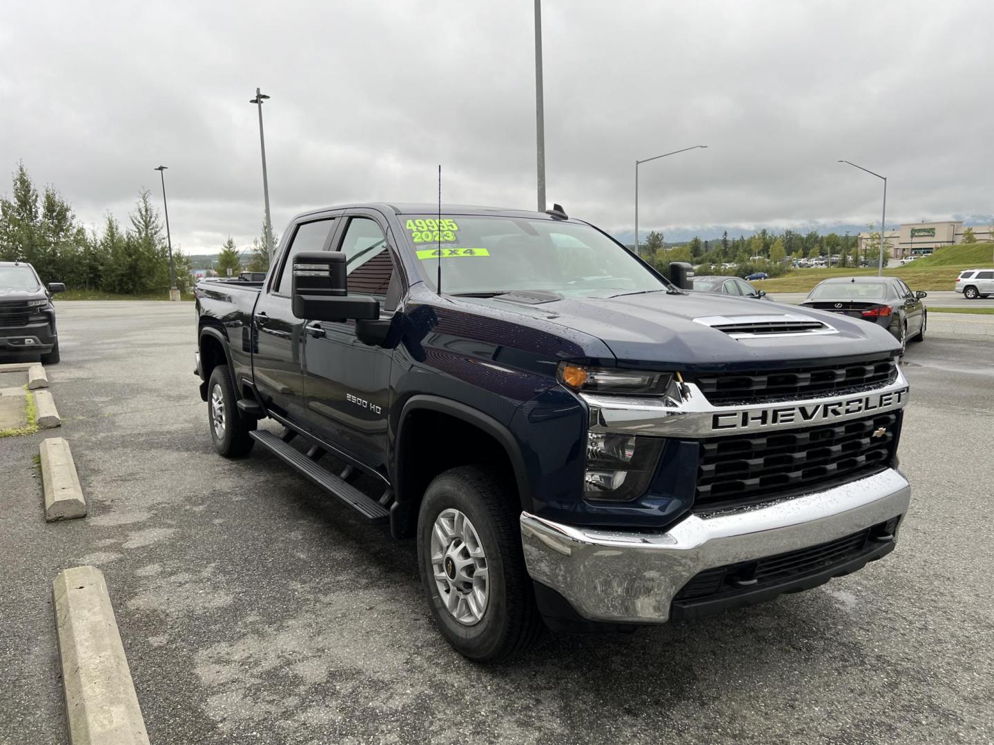 2023 BLUE Chevrolet Silverado 2500HD LT Crew Cab Short Box 4WD (2GC4YNE7XP1) with an 6.6L V8 OHV 16V engine, 6A transmission, located at 1960 Industrial Drive, Wasilla, 99654, (907) 274-2277, 61.573475, -149.400146 - Photo#0