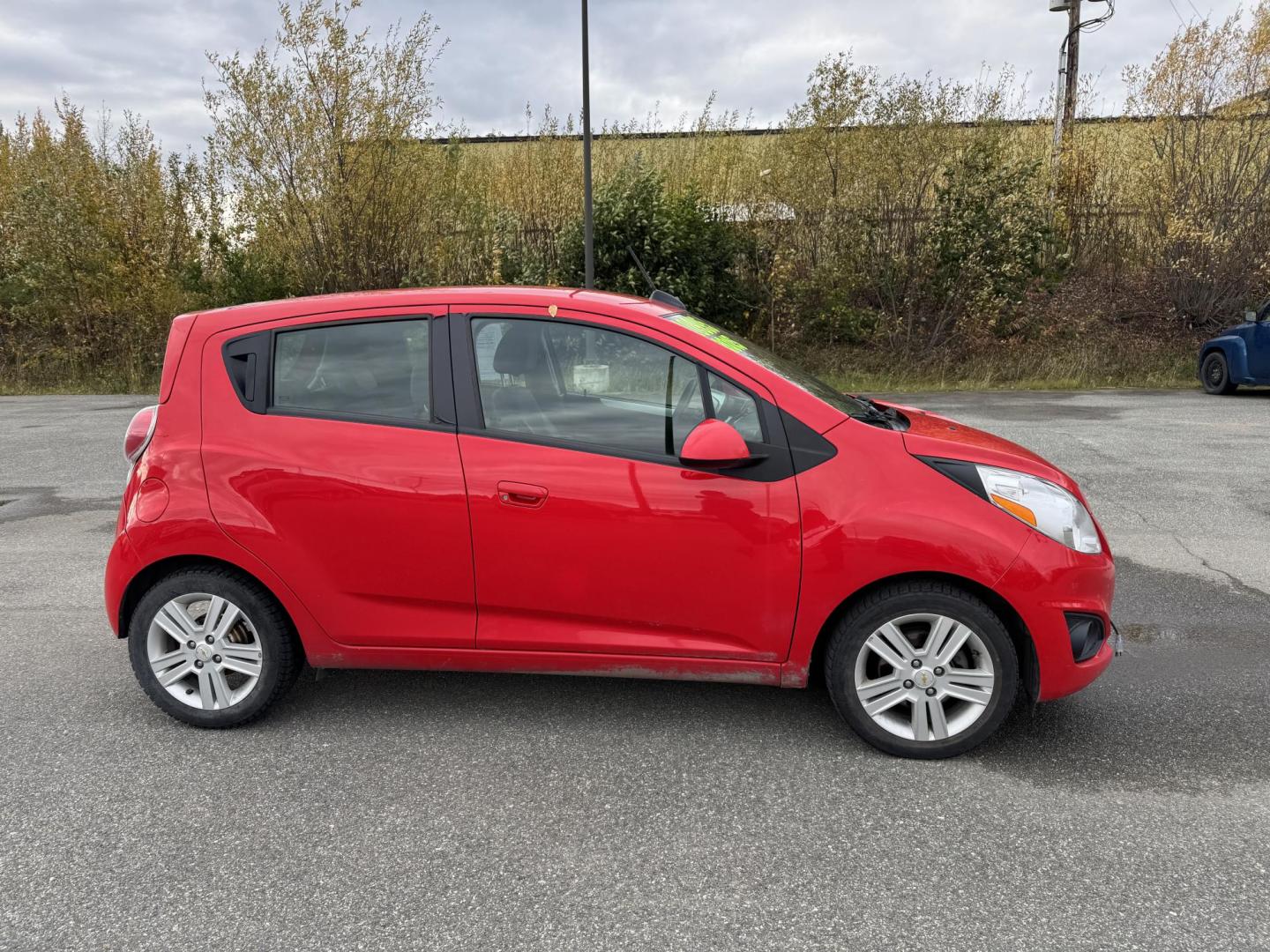 2015 RED CHEVROLET SPARK 1LT (KL8CD6S95FC) with an 1.2L engine, Continuously Variable transmission, located at 1960 Industrial Drive, Wasilla, 99654, (907) 274-2277, 61.573475, -149.400146 - Photo#0