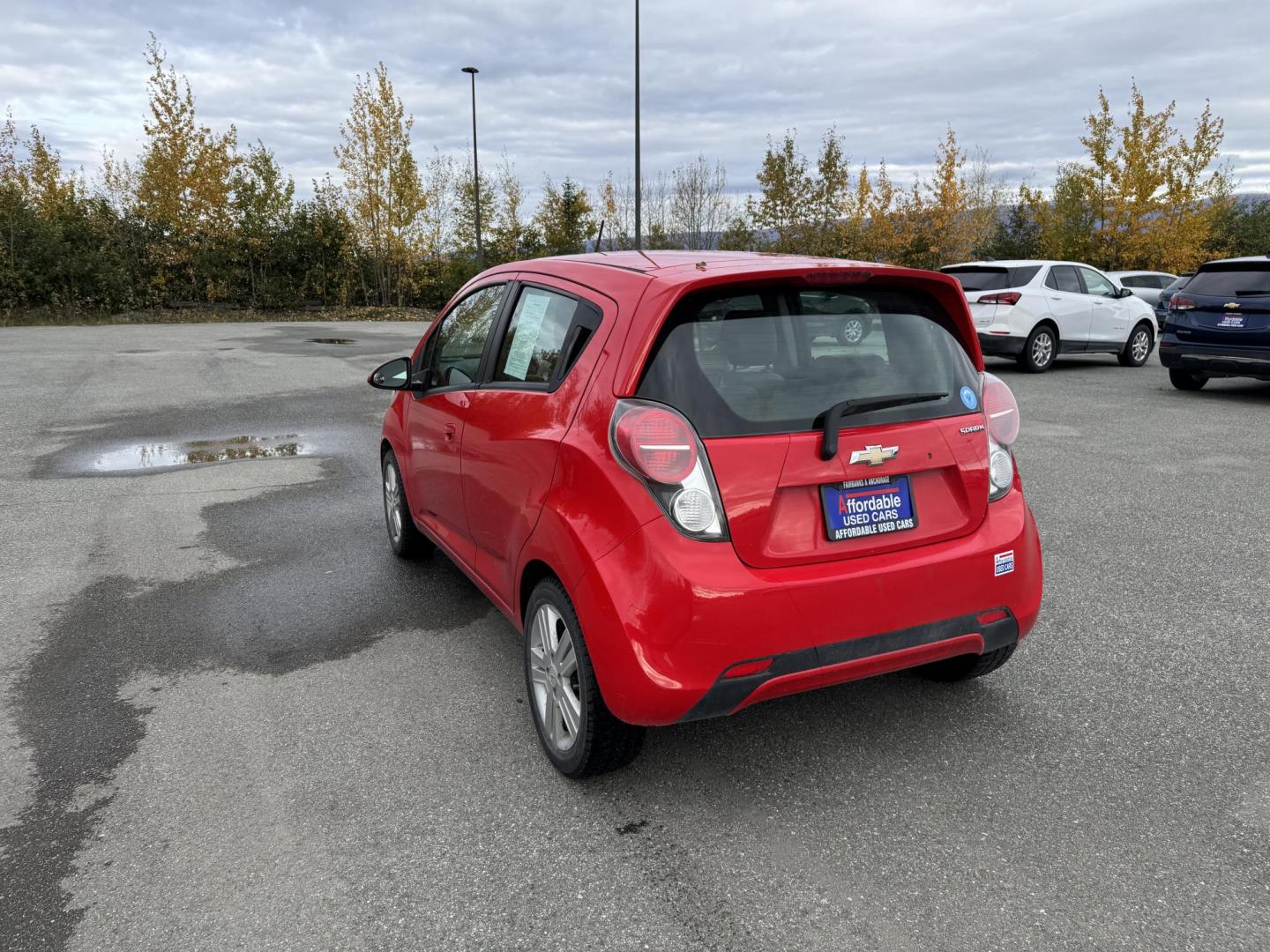 2015 RED CHEVROLET SPARK 1LT (KL8CD6S95FC) with an 1.2L engine, Continuously Variable transmission, located at 1960 Industrial Drive, Wasilla, 99654, (907) 274-2277, 61.573475, -149.400146 - Photo#6